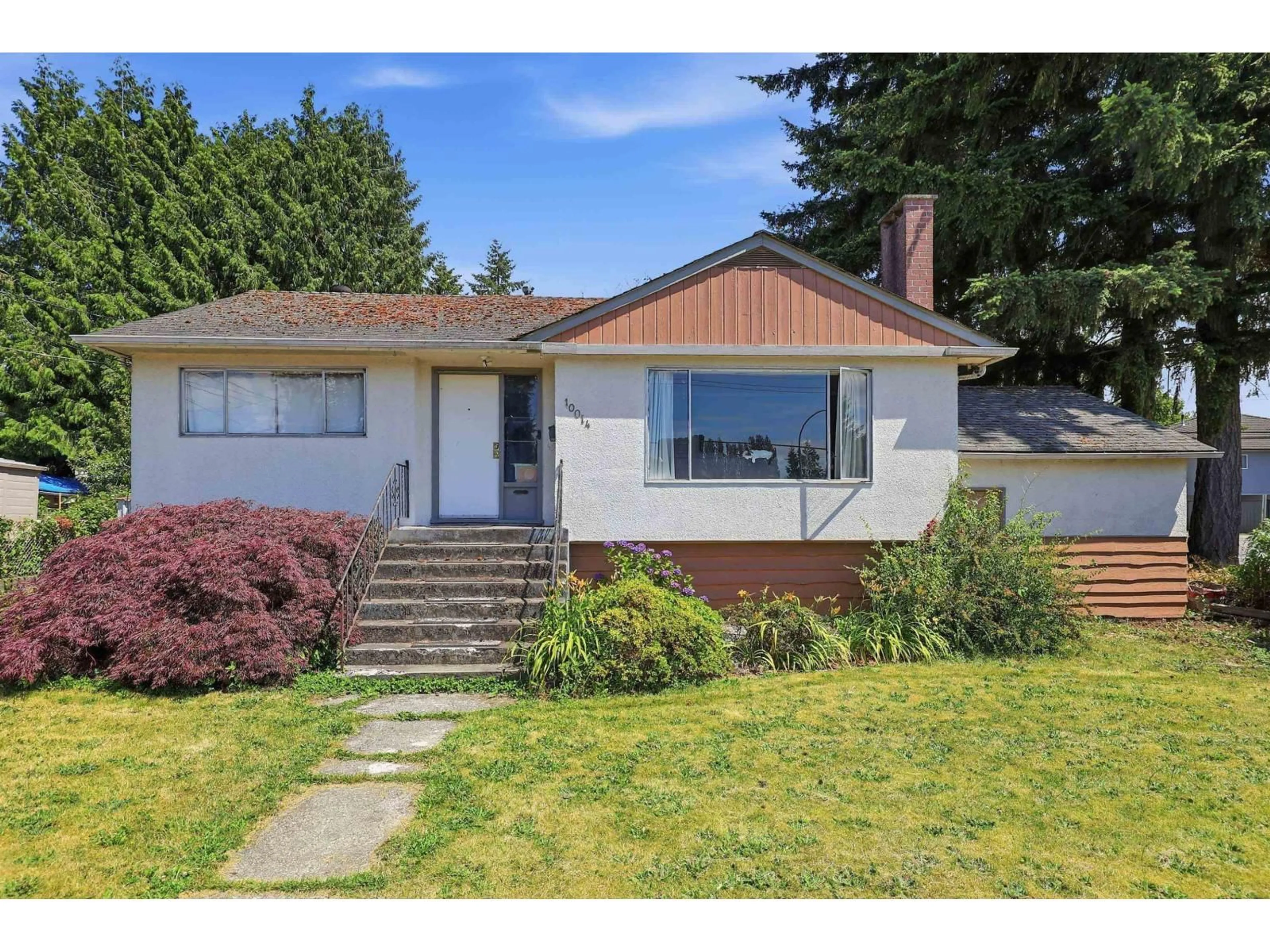 Home with vinyl exterior material, street for 10014 127B STREET, Surrey British Columbia V3V5M3