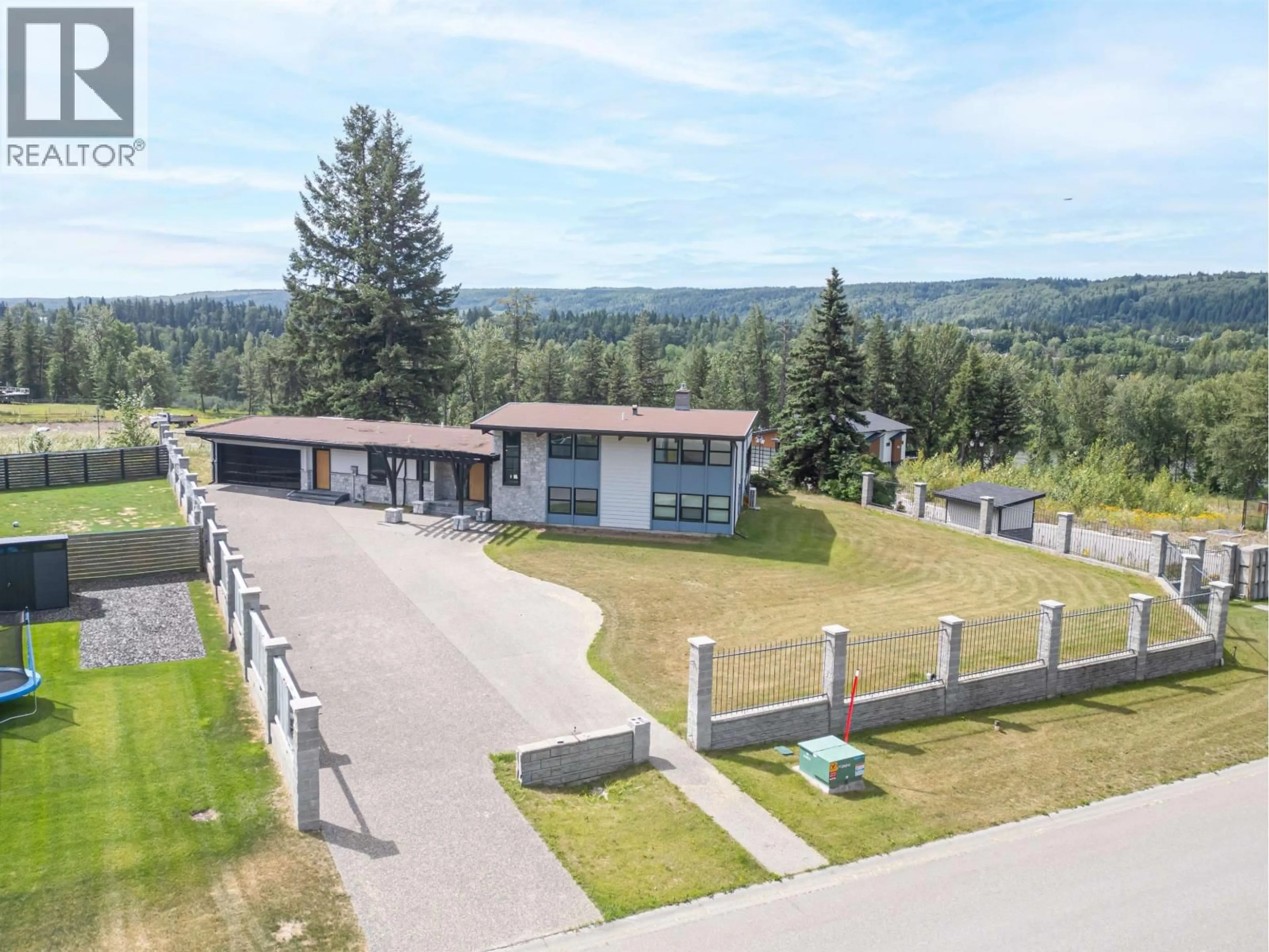 A pic from outside/outdoor area/front of a property/back of a property/a pic from drone, mountain view for 4069 BRINK PLACE, Prince George British Columbia V2K5G8