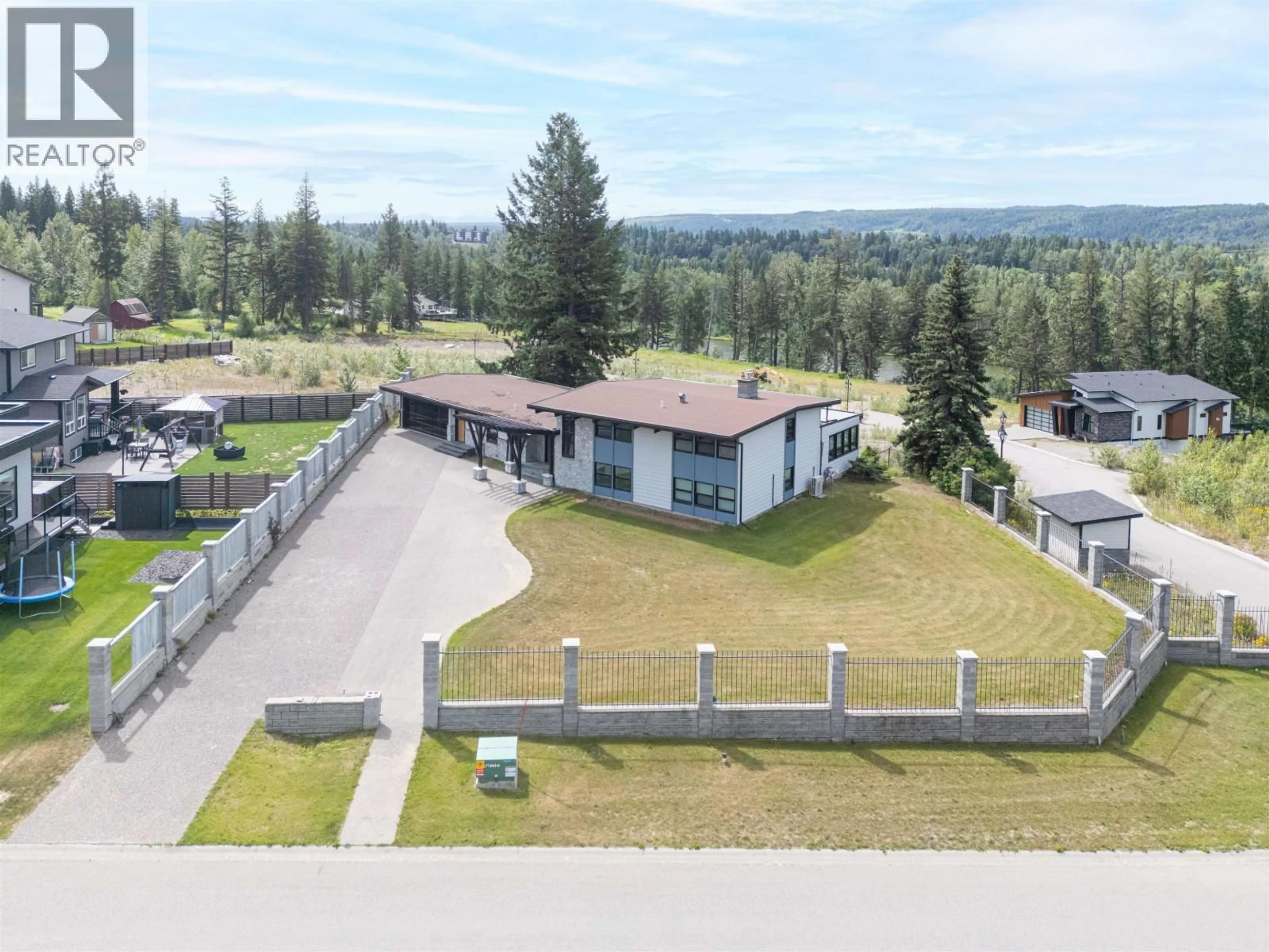 A pic from outside/outdoor area/front of a property/back of a property/a pic from drone, mountain view for 4069 BRINK PLACE, Prince George British Columbia V2K5G8