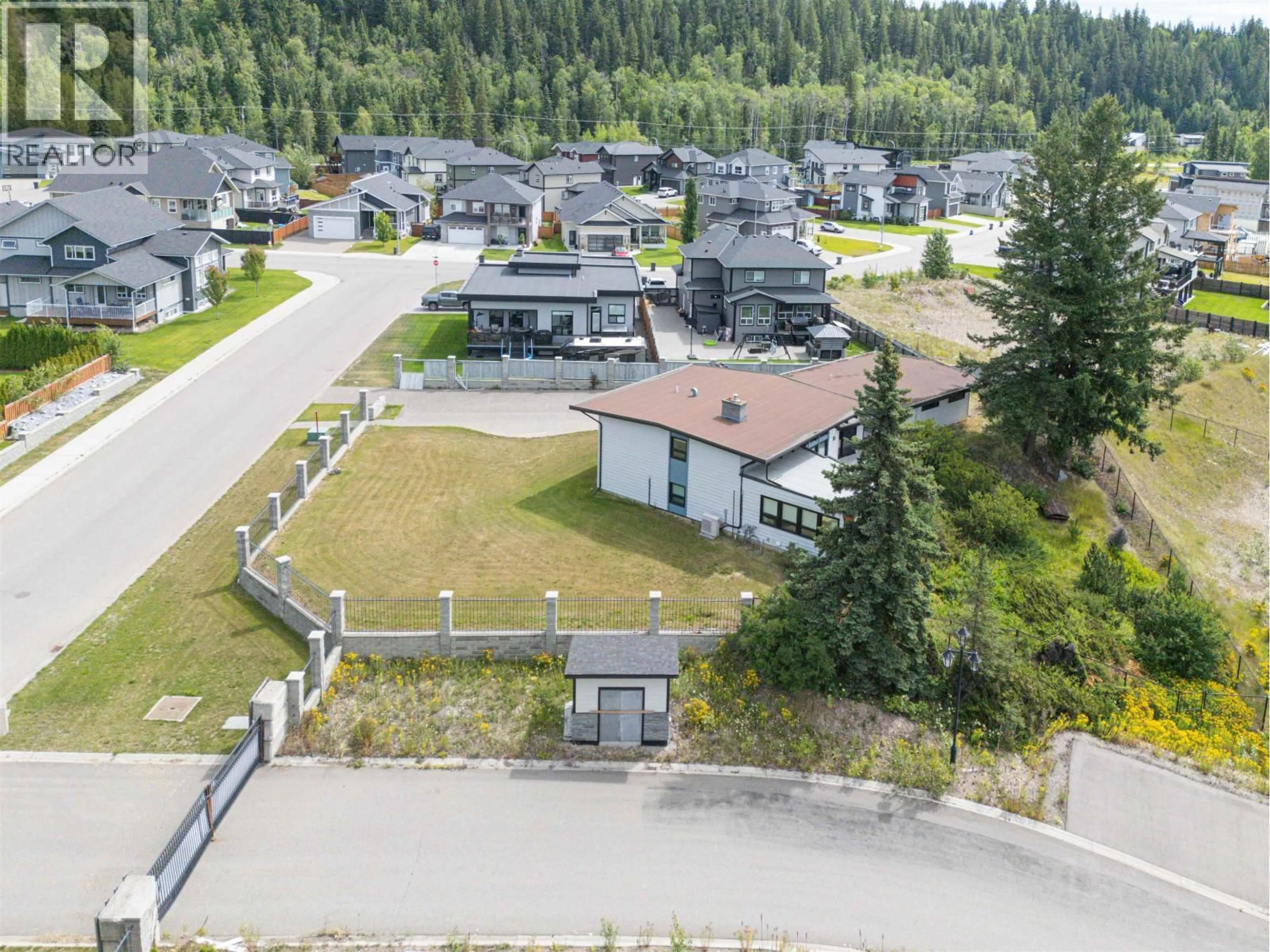 A pic from outside/outdoor area/front of a property/back of a property/a pic from drone, mountain view for 4069 BRINK PLACE, Prince George British Columbia V2K5G8