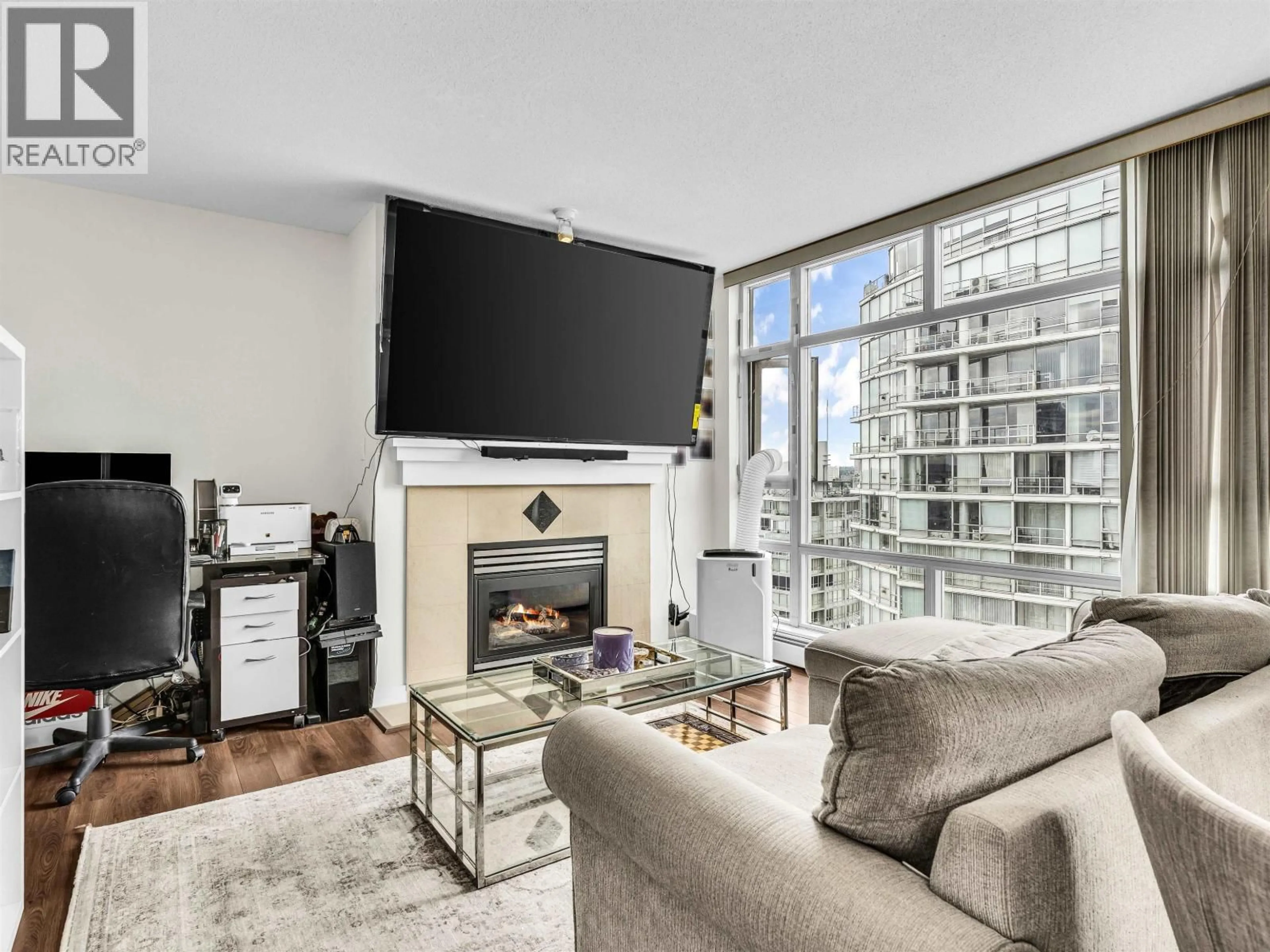 Living room with furniture, unknown for 2807 - 1199 MARINASIDE CRESCENT, Vancouver British Columbia V6Z2Y2