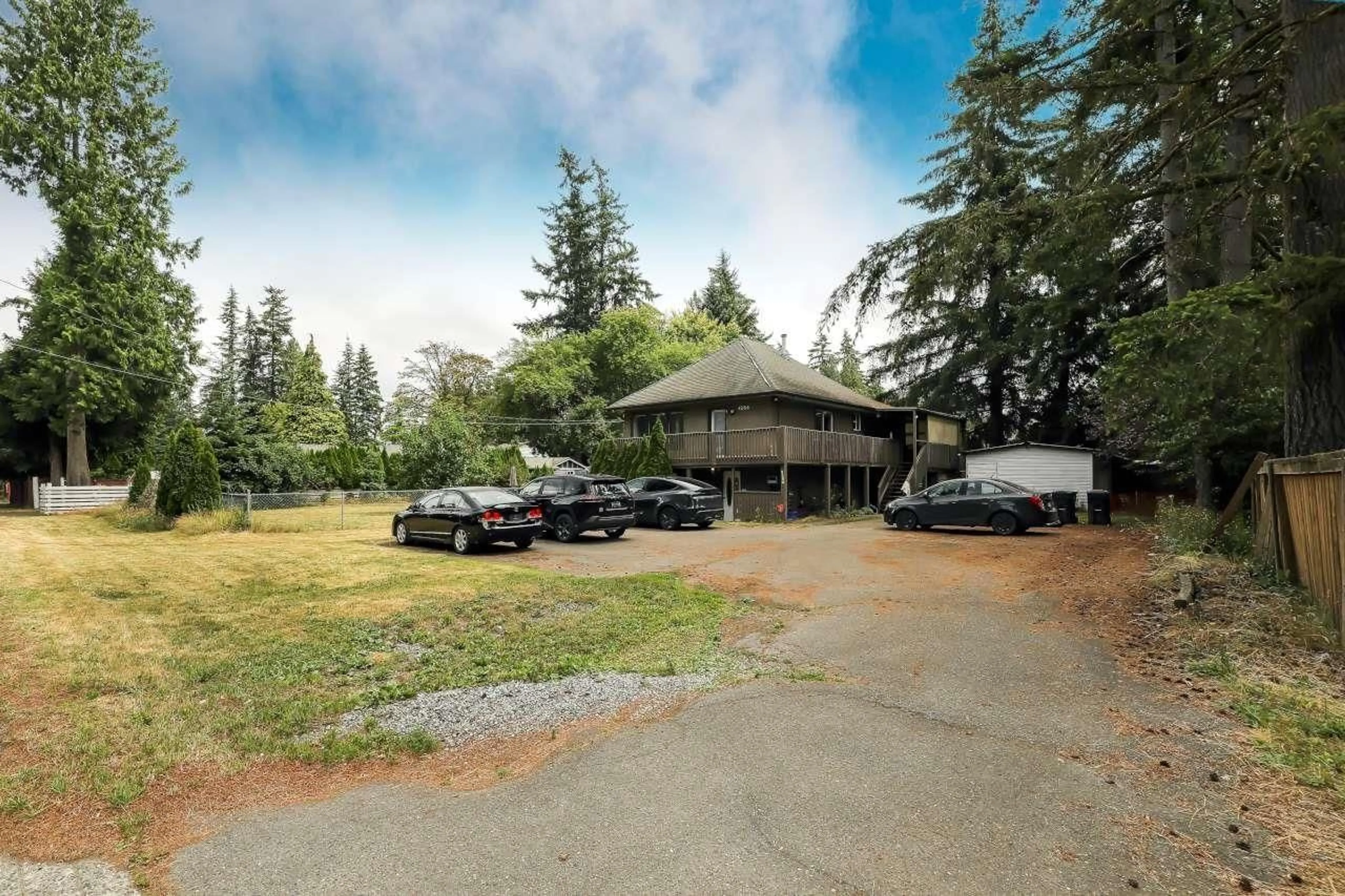 A pic from outside/outdoor area/front of a property/back of a property/a pic from drone, mountain view for 4288 200 STREET, Langley British Columbia V3A1L1