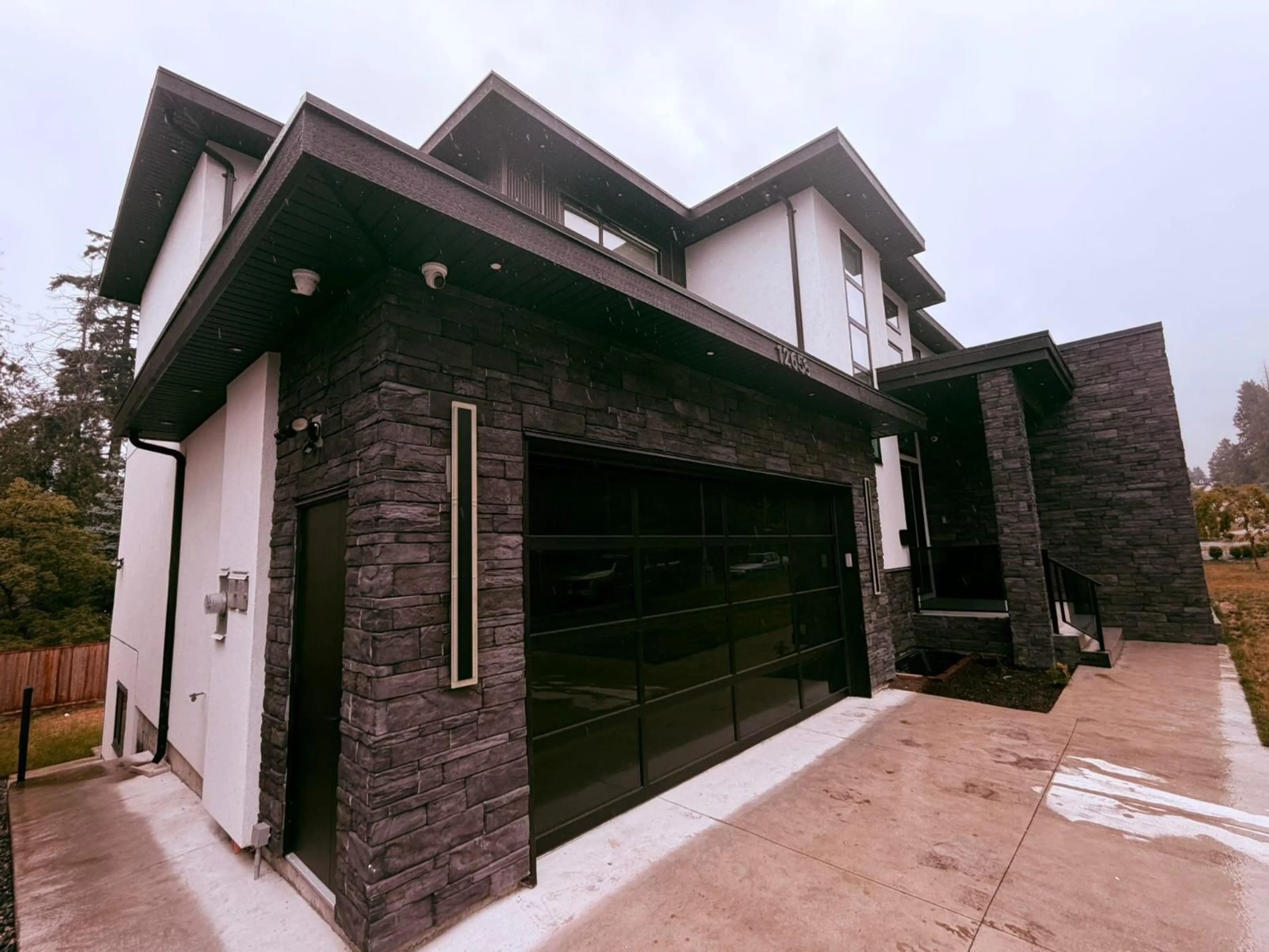 Home with brick exterior material, street for 12655 106A AVENUE, Surrey British Columbia V3V5K4