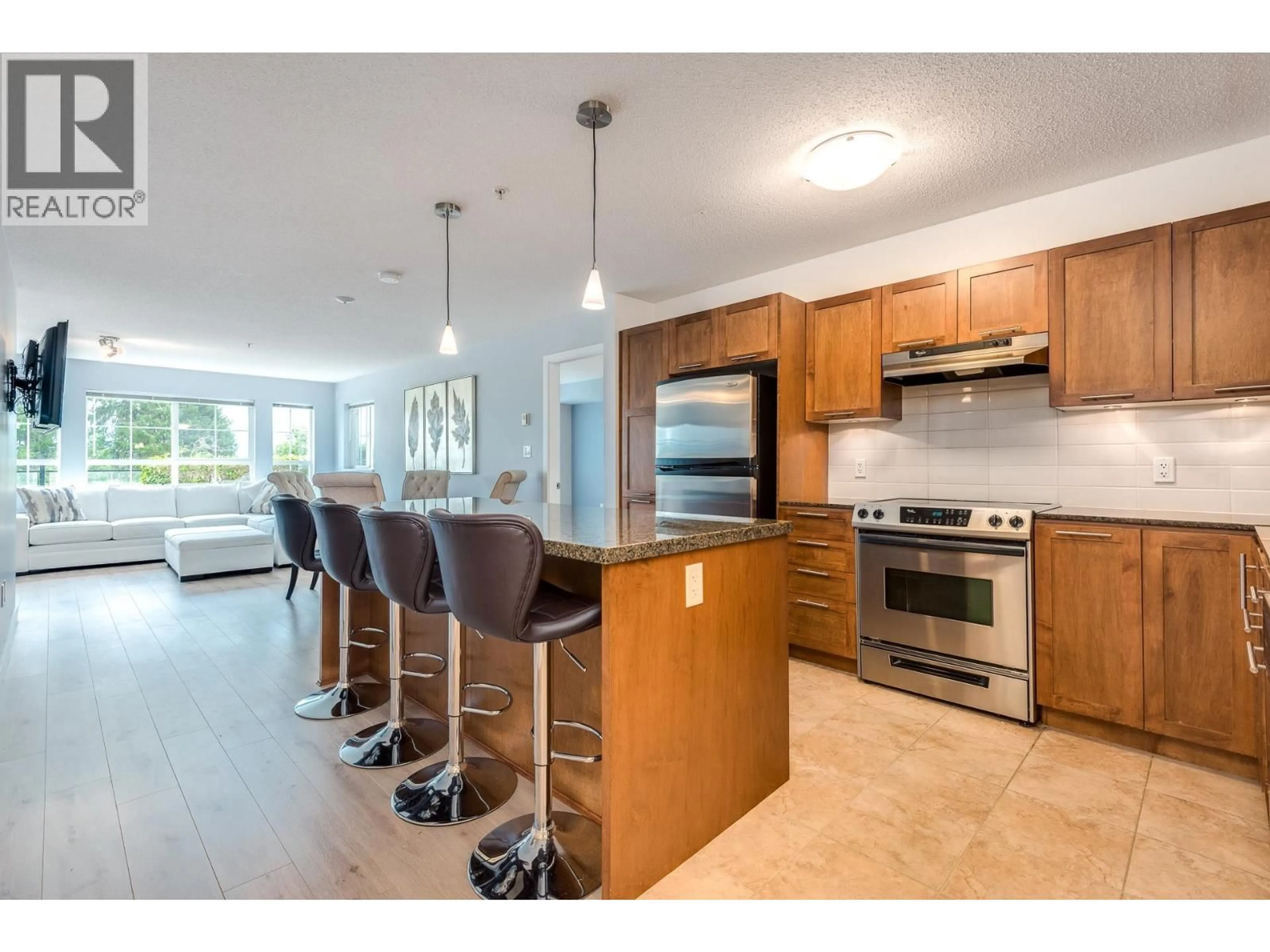 Open concept kitchen, ceramic/tile floor for 129 - 19673 MEADOW GARDENS WAY, Pitt Meadows British Columbia V3Y0A1