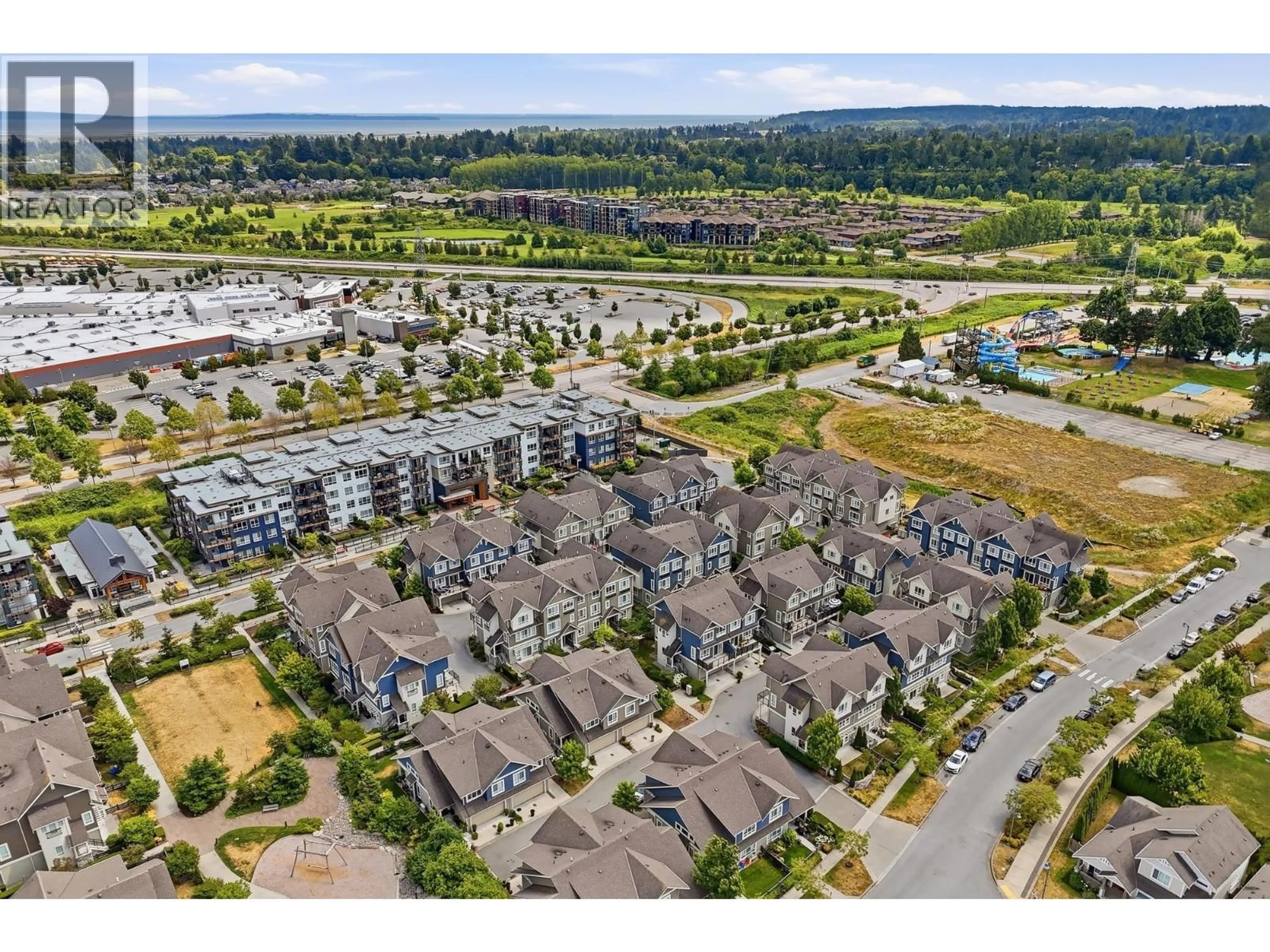 A pic from outside/outdoor area/front of a property/back of a property/a pic from drone, unknown for 204 - 1816 OSPREY DRIVE, Delta British Columbia V4M0B8