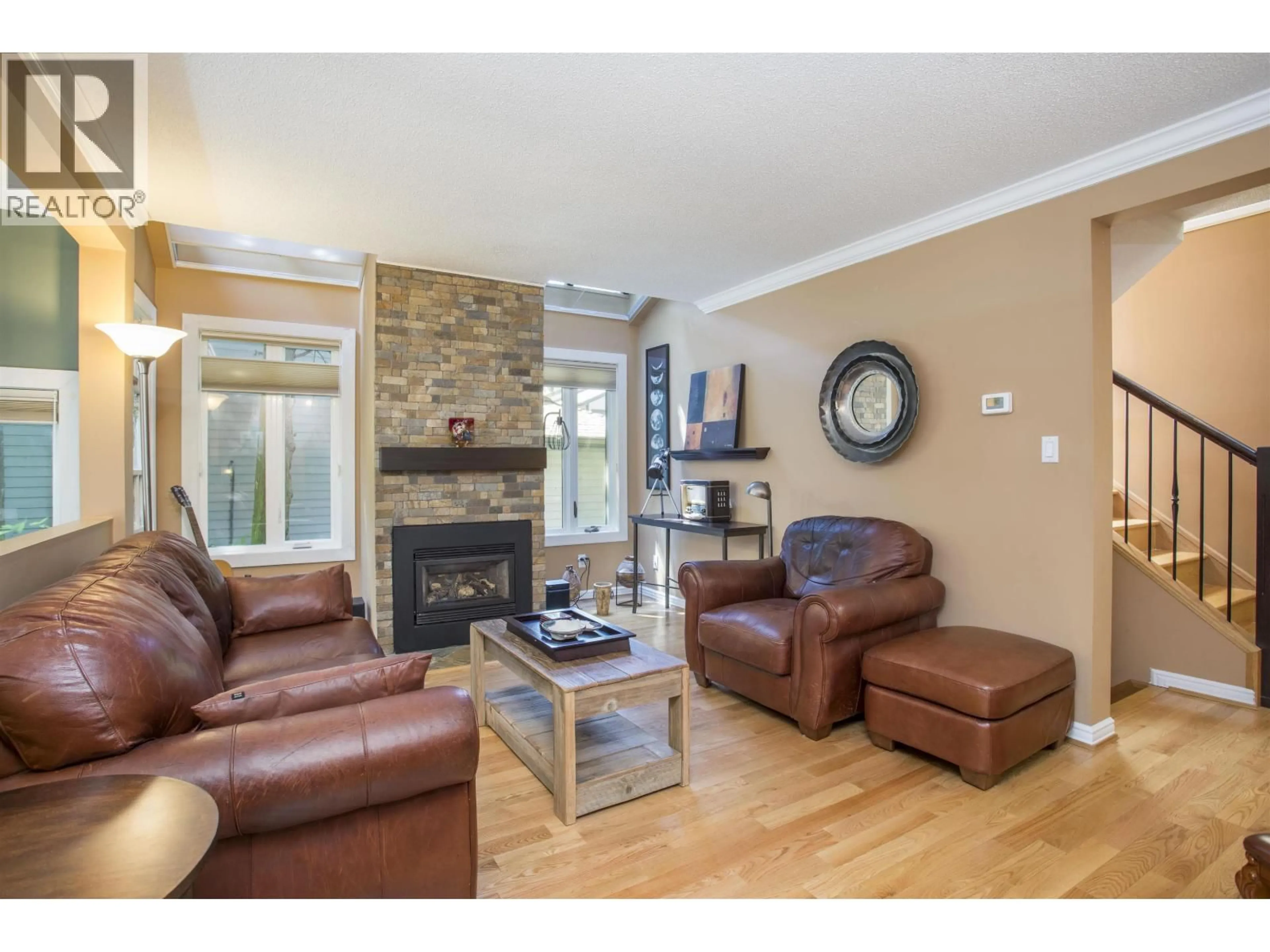 Living room with furniture, wood/laminate floor for 1989 CEDAR VILLAGE CRESCENT, North Vancouver British Columbia V7J3P5