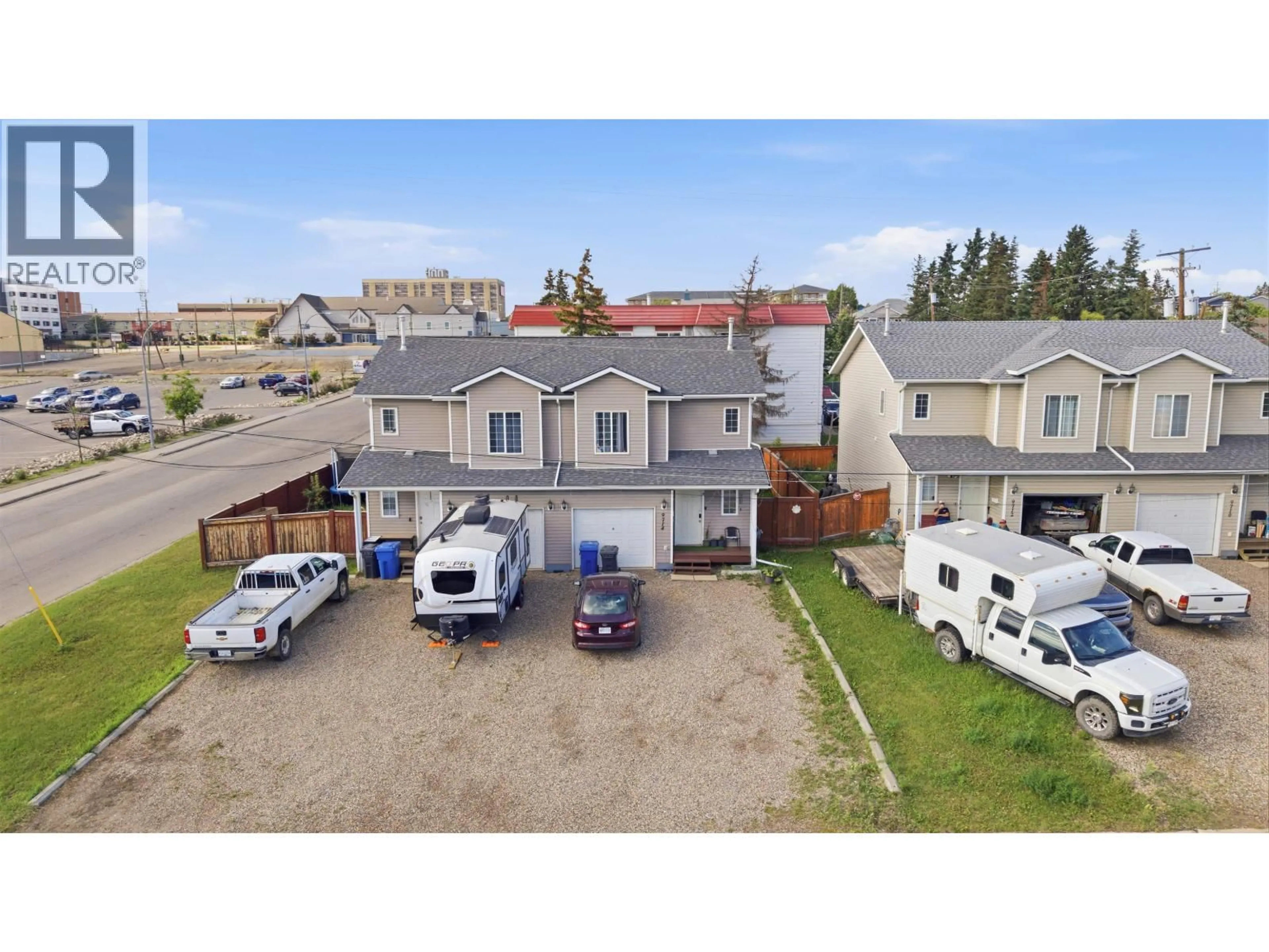A pic from outside/outdoor area/front of a property/back of a property/a pic from drone, street for 9714 97 AVENUE, Fort St. John British Columbia V1J1N4