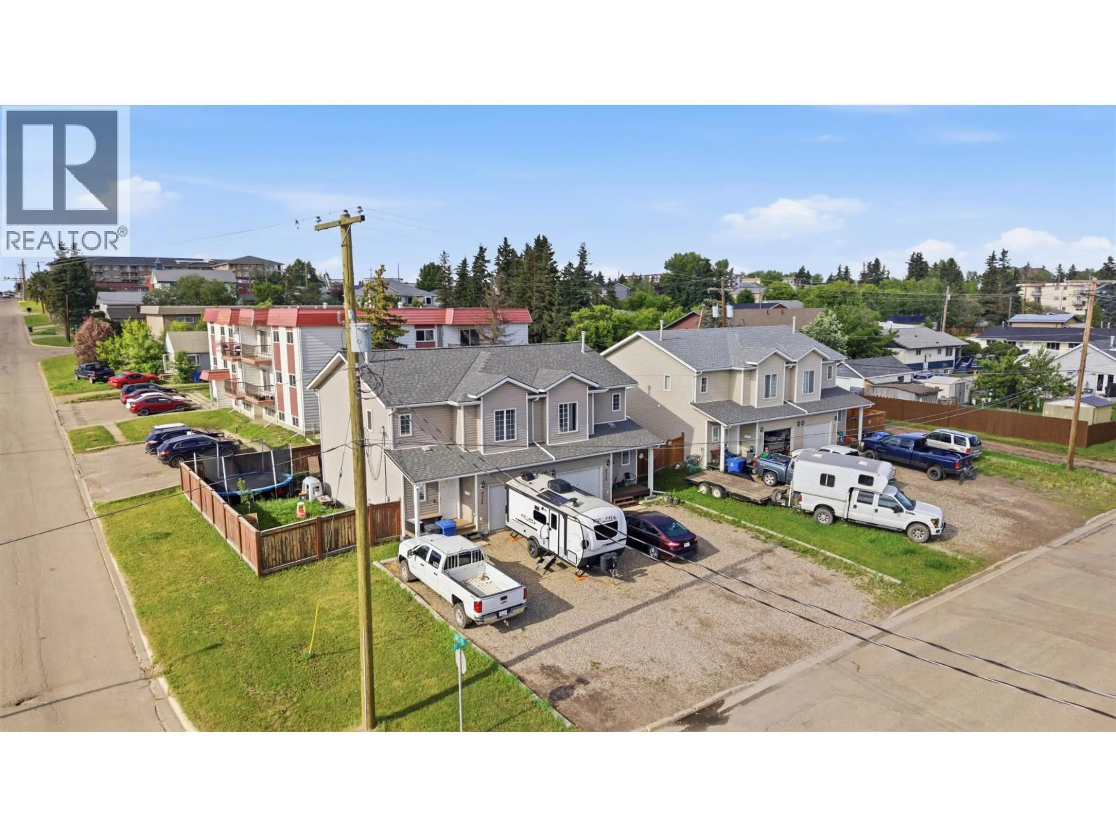 A pic from outside/outdoor area/front of a property/back of a property/a pic from drone, street for 9714 97 AVENUE, Fort St. John British Columbia V1J1N4