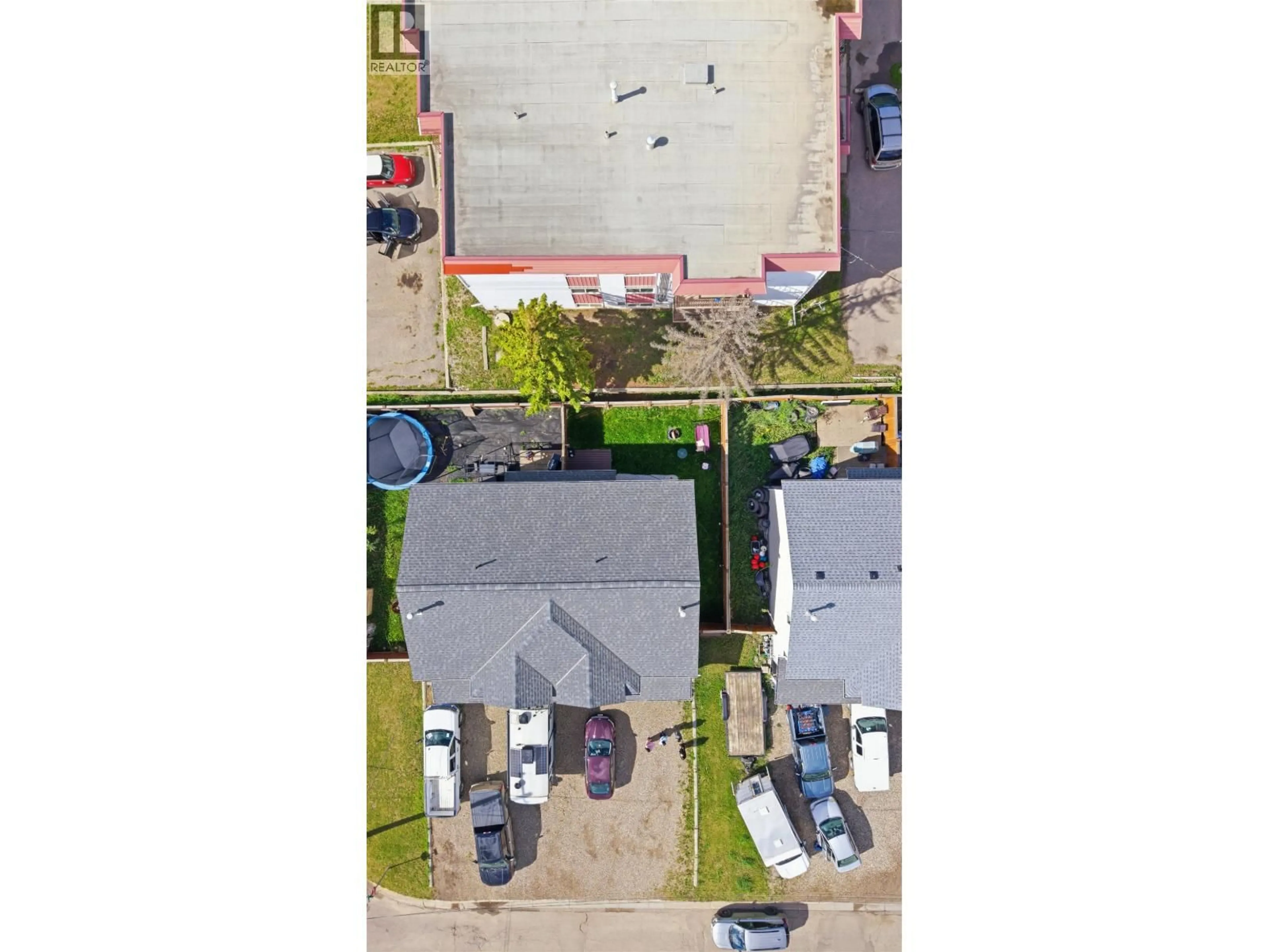 A pic from outside/outdoor area/front of a property/back of a property/a pic from drone, street for 9714 97 AVENUE, Fort St. John British Columbia V1J1N4