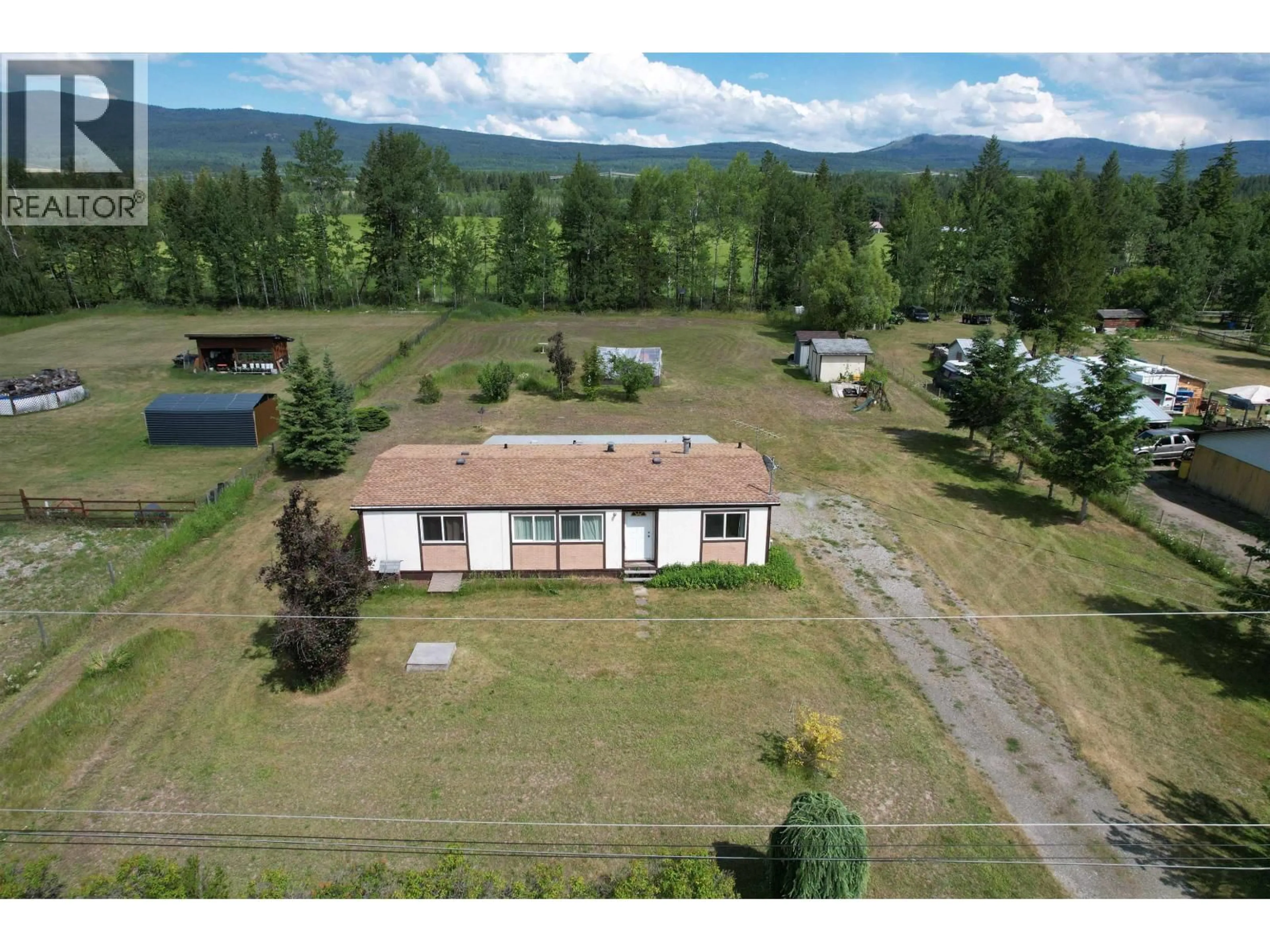 A pic from outside/outdoor area/front of a property/back of a property/a pic from drone, mountain view for 4719 DUSTY ROAD, Quesnel British Columbia V2J6L5
