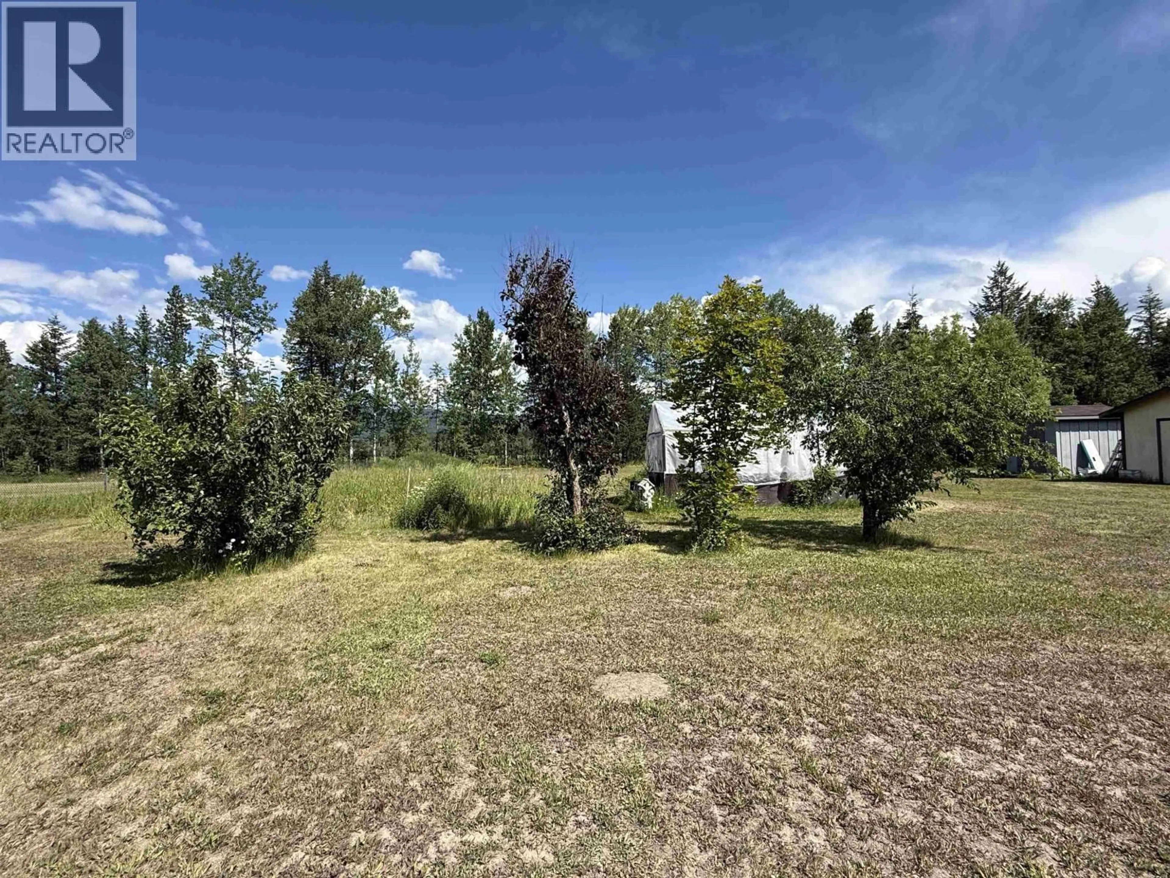 A pic from outside/outdoor area/front of a property/back of a property/a pic from drone, forest/trees view for 4719 DUSTY ROAD, Quesnel British Columbia V2J6L5