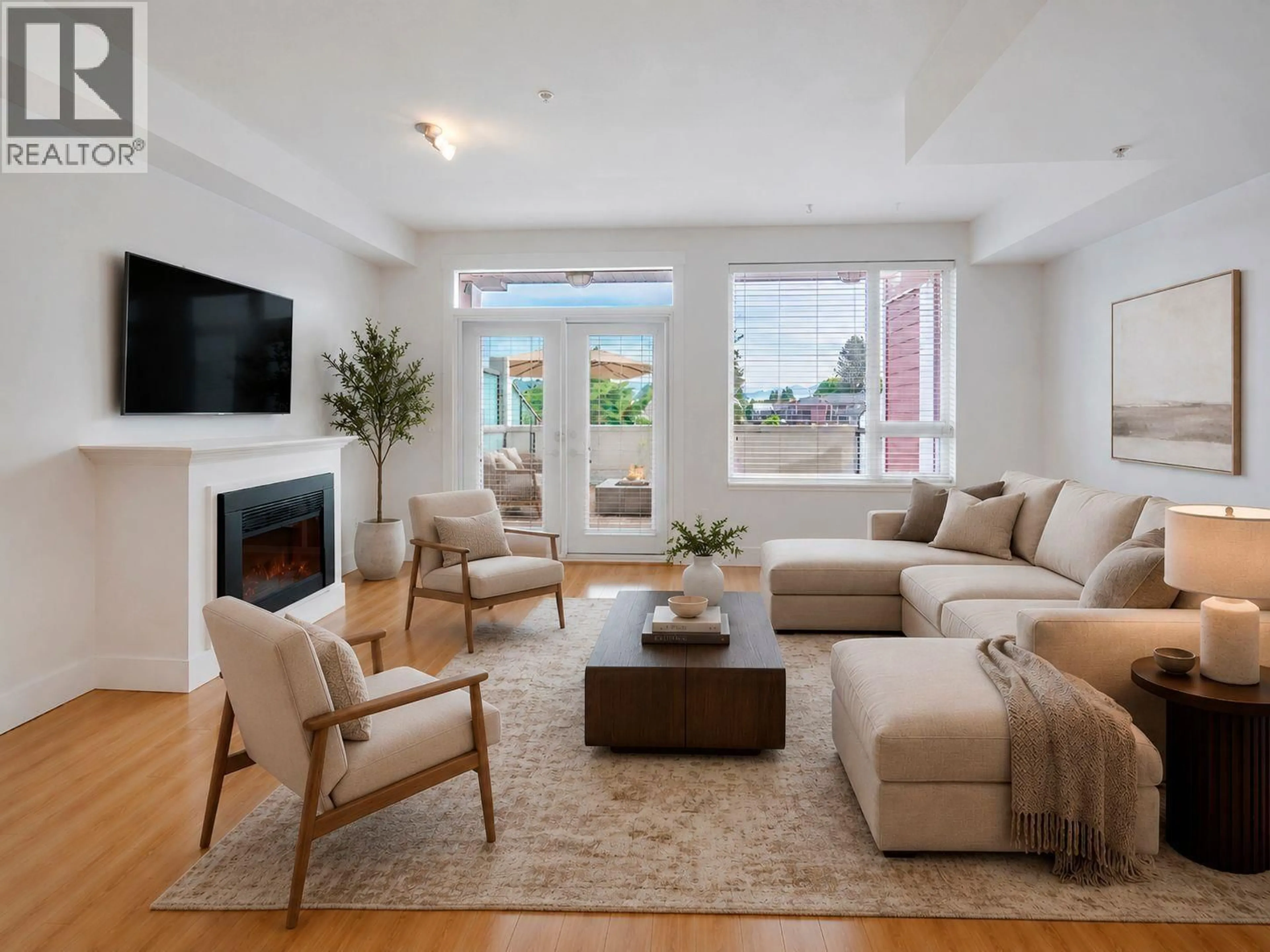 Living room with furniture, unknown for 205 - 7908 GRAHAM AVENUE, Burnaby British Columbia V3N1V9