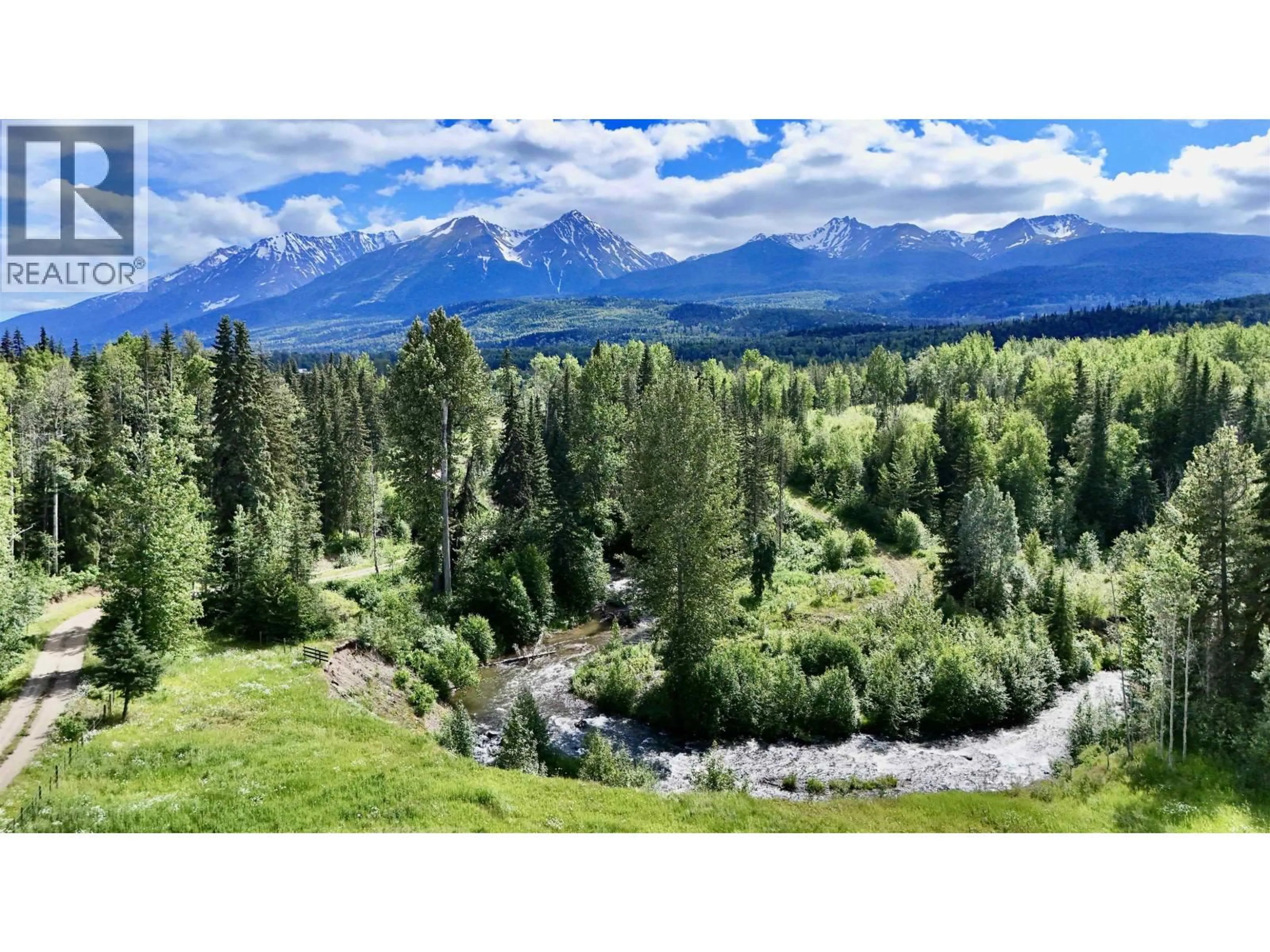 A pic from outside/outdoor area/front of a property/back of a property/a pic from drone, mountain view for 23033 16 HIGHWAY, Smithers British Columbia V0J2N1