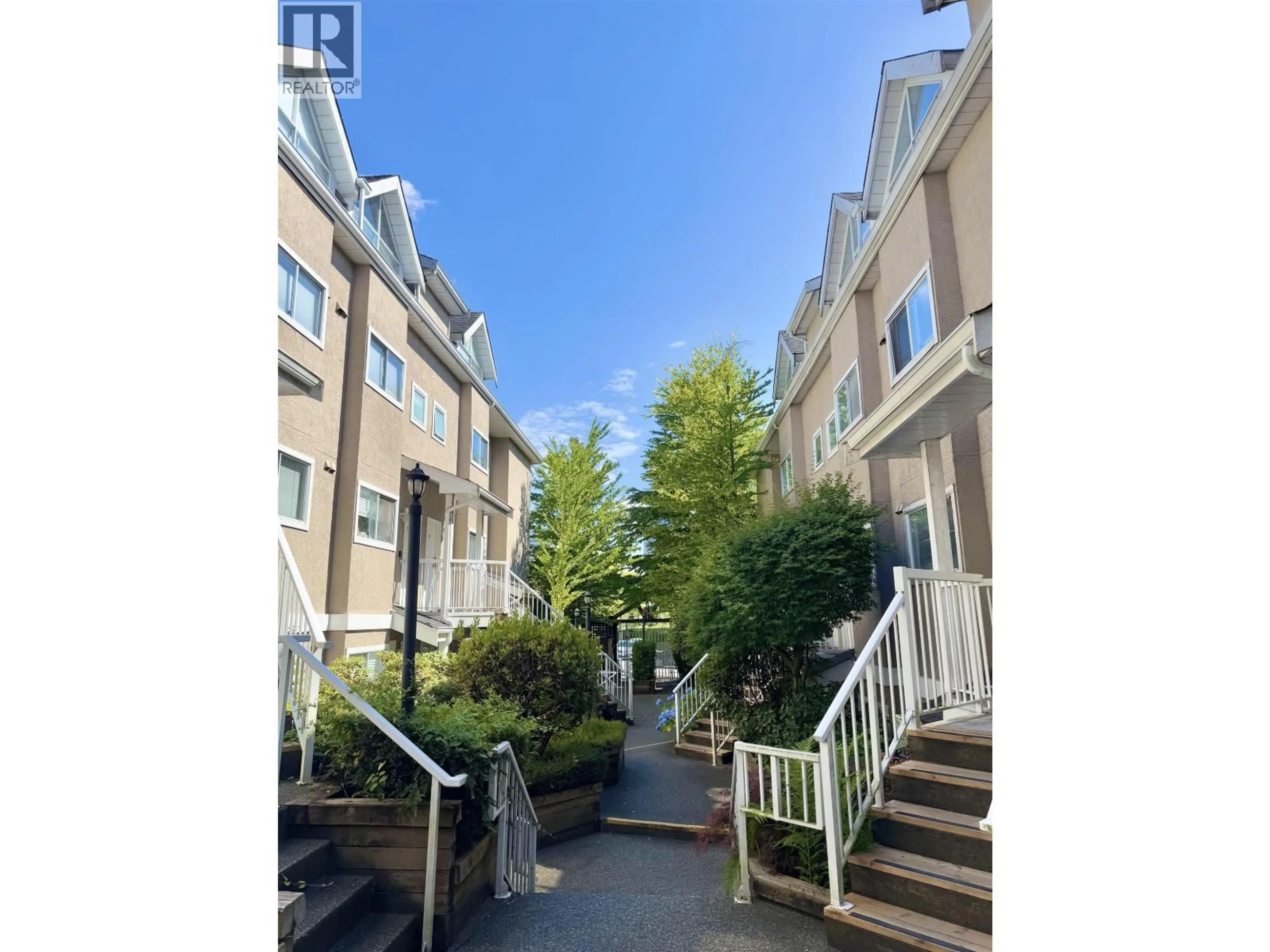 A pic from outside/outdoor area/front of a property/back of a property/a pic from drone, street for 202 - 3683 WELLINGTON AVENUE, Vancouver British Columbia V5R4Z5