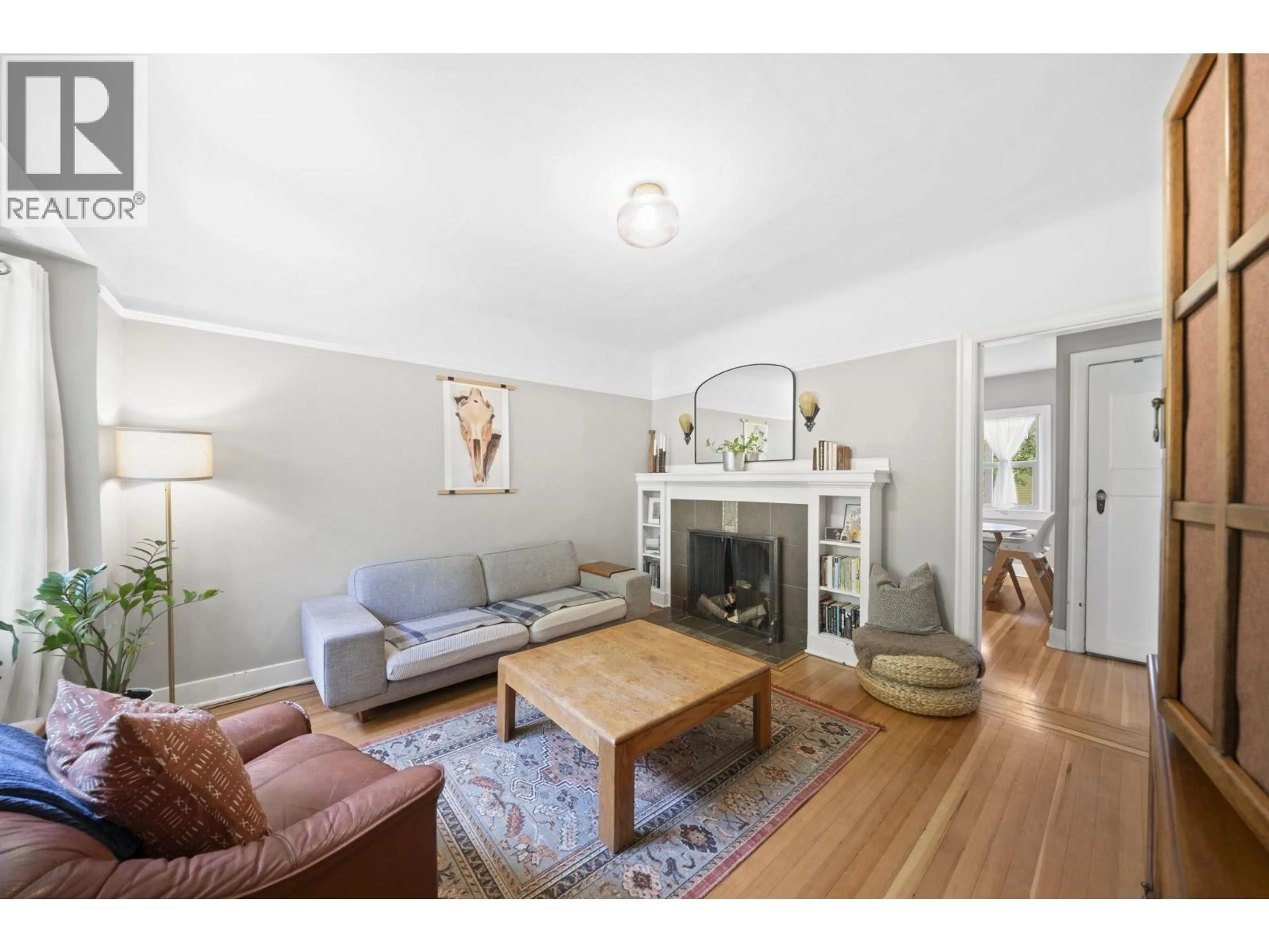 Living room with furniture, wood/laminate floor for 3750 17TH AVENUE, Vancouver British Columbia V6S1A2
