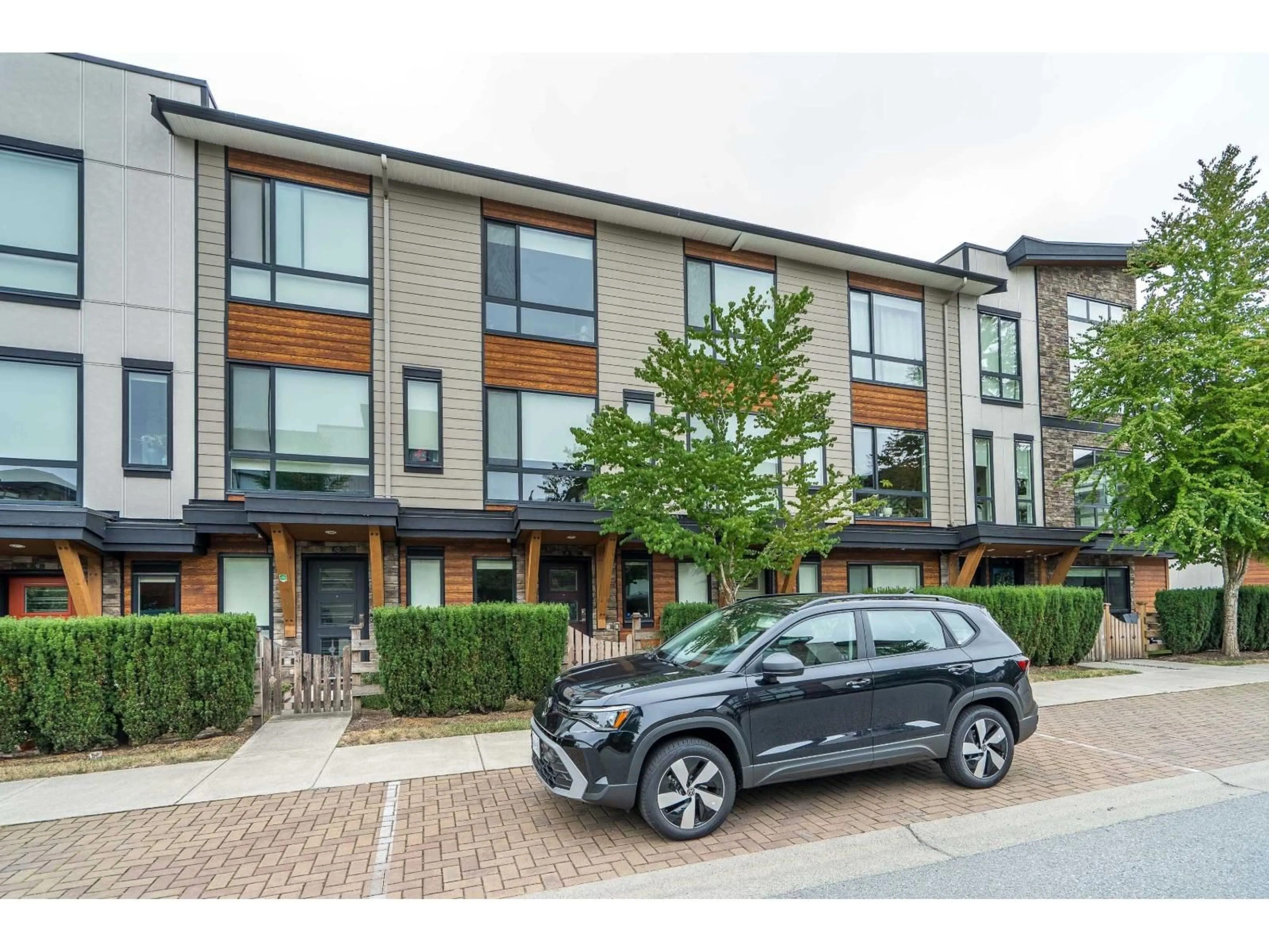 A pic from outside/outdoor area/front of a property/back of a property/a pic from drone, street for 11 - 16488 64 AVENUE, Surrey British Columbia V3S6X6