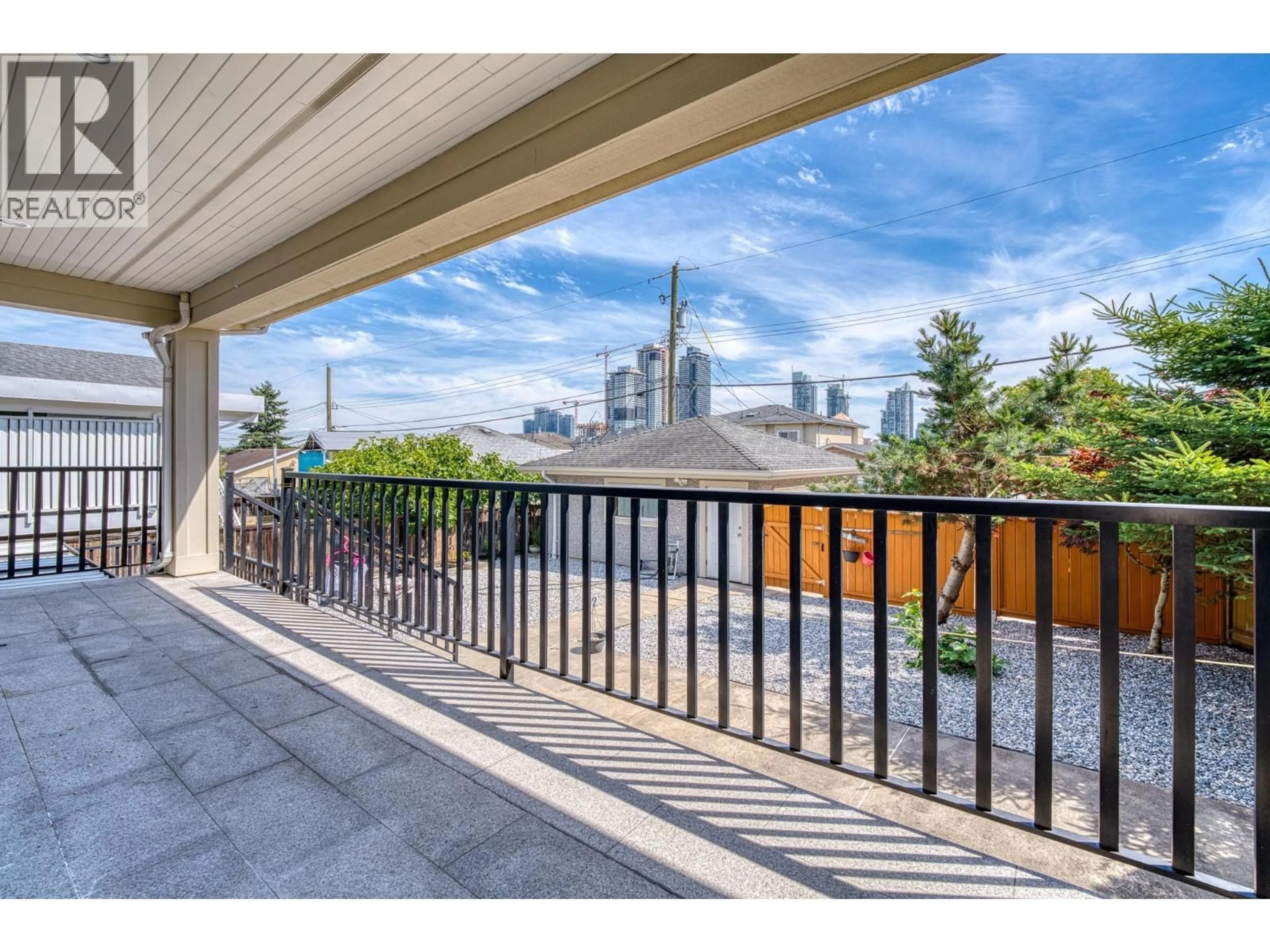 Patio, city buildings view from balcony for 4330 WILLIAM STREET, Burnaby British Columbia V5C3J9