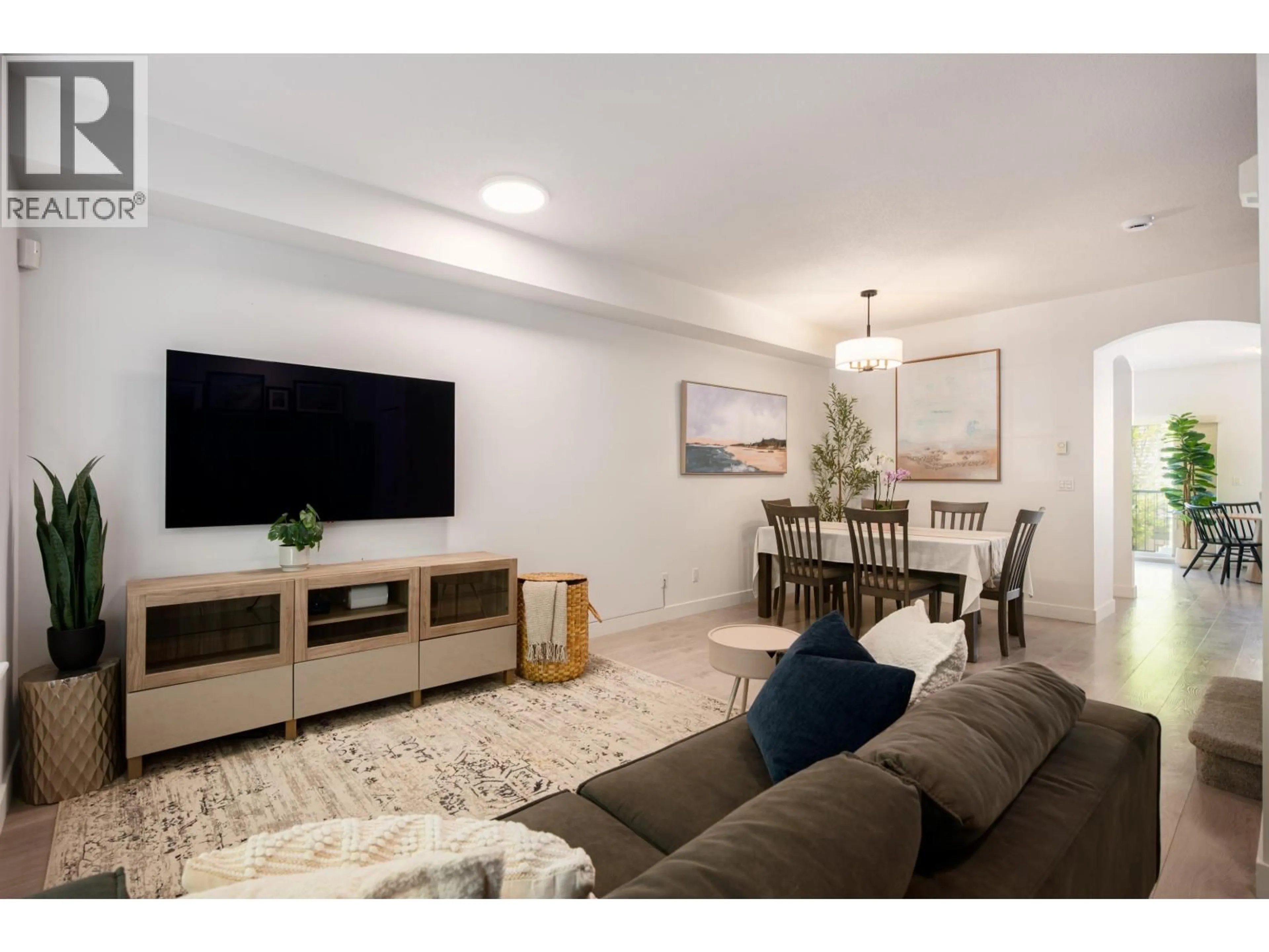 Living room with furniture, wood/laminate floor for 2 - 8533 CUMBERLAND PLACE, Burnaby British Columbia V3N5C1