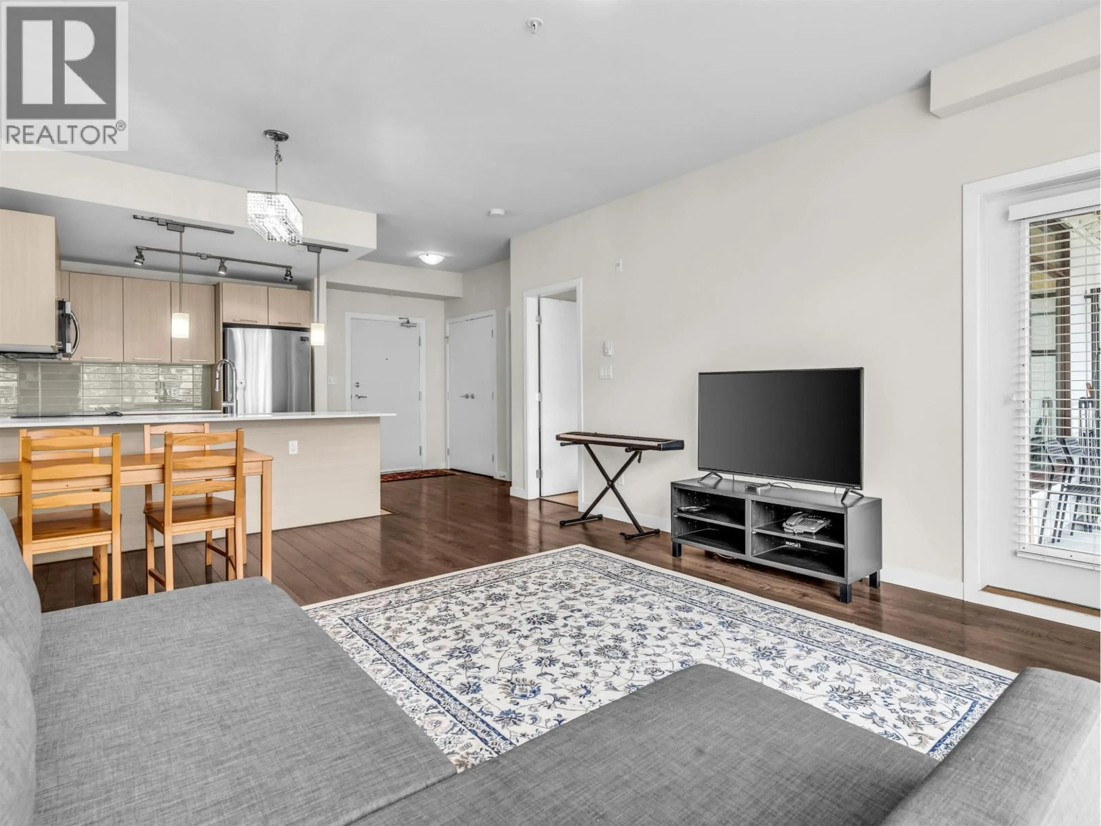 Living room with furniture, unknown for 210 - 5248 GRIMMER STREET, Burnaby British Columbia V5H0E1