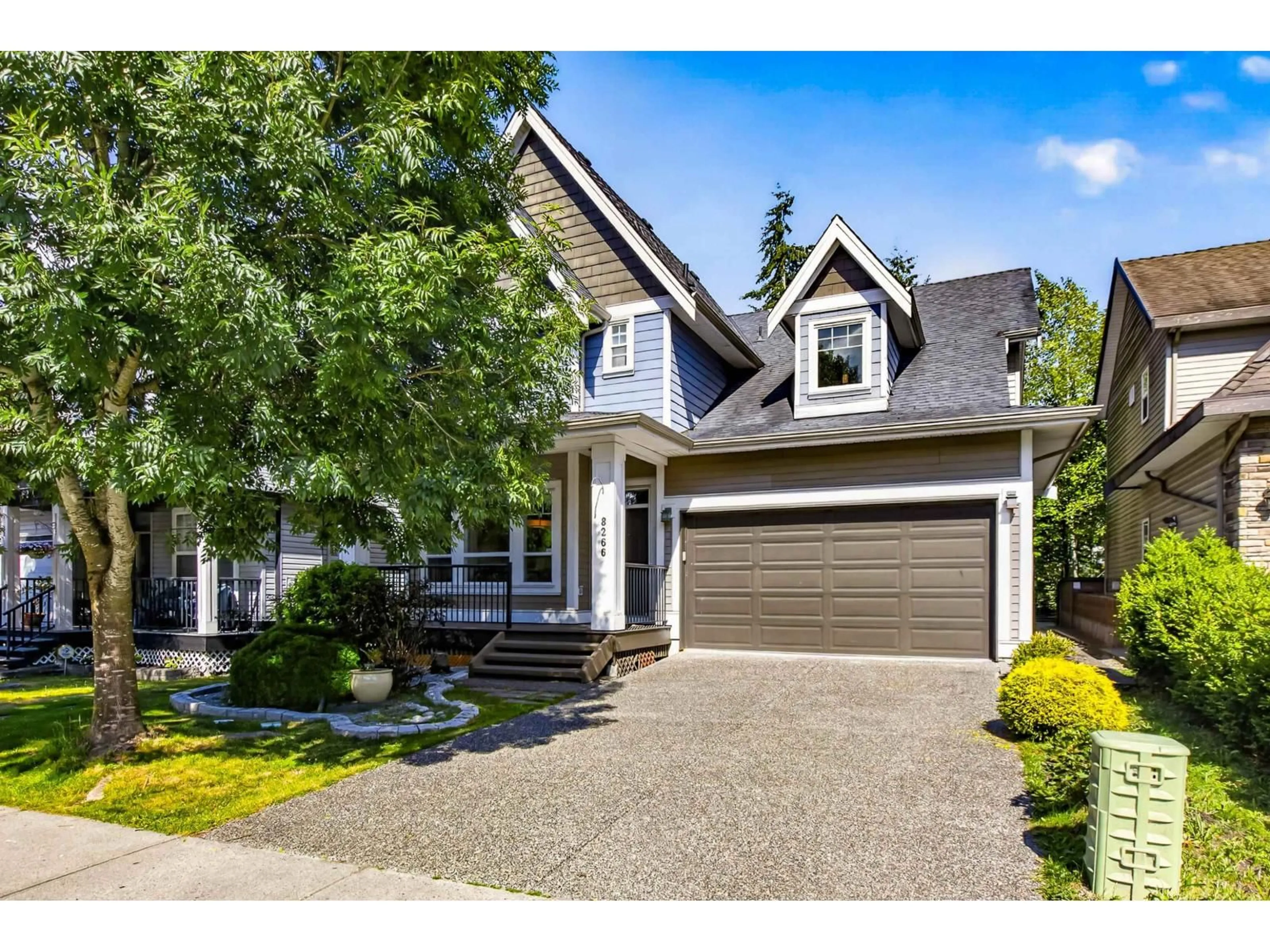 Home with vinyl exterior material, street for 8266 211 STREET, Langley British Columbia V2Y0E4