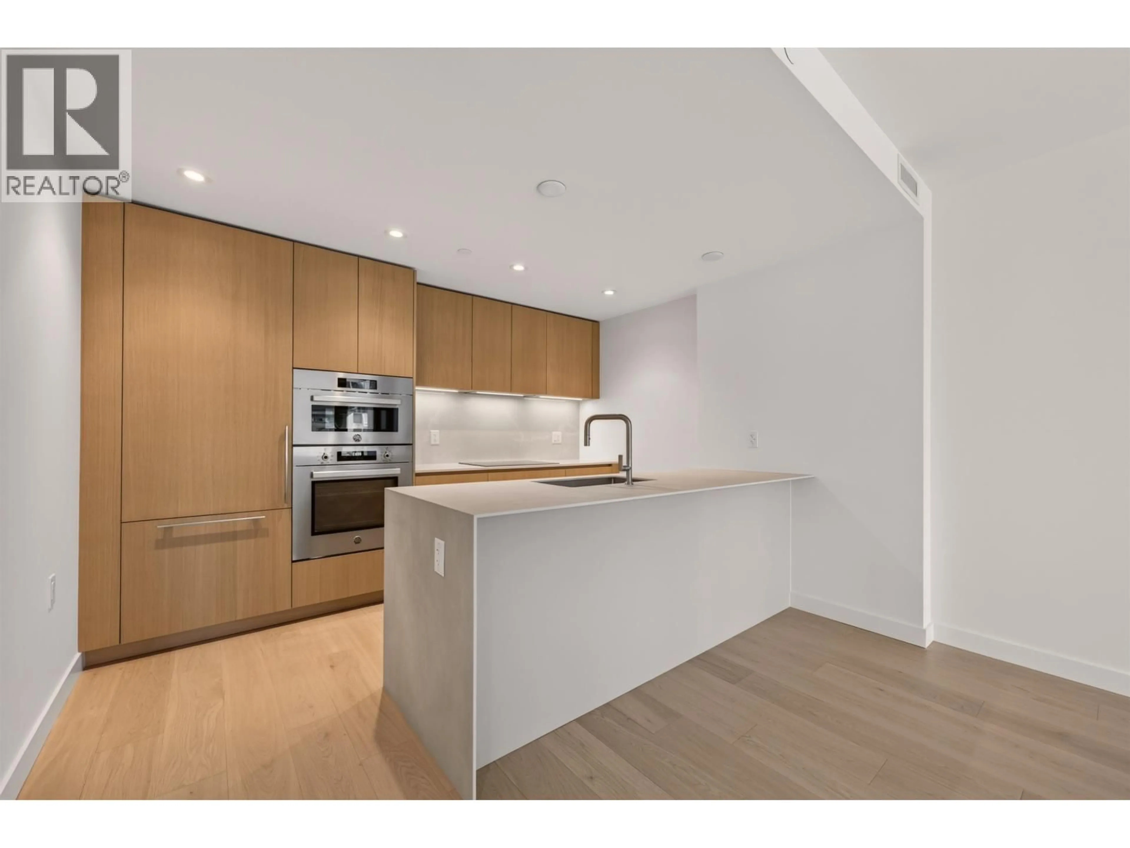 Open concept kitchen, unknown for 302 - 1526 6TH AVENUE, Vancouver British Columbia V6J0J9