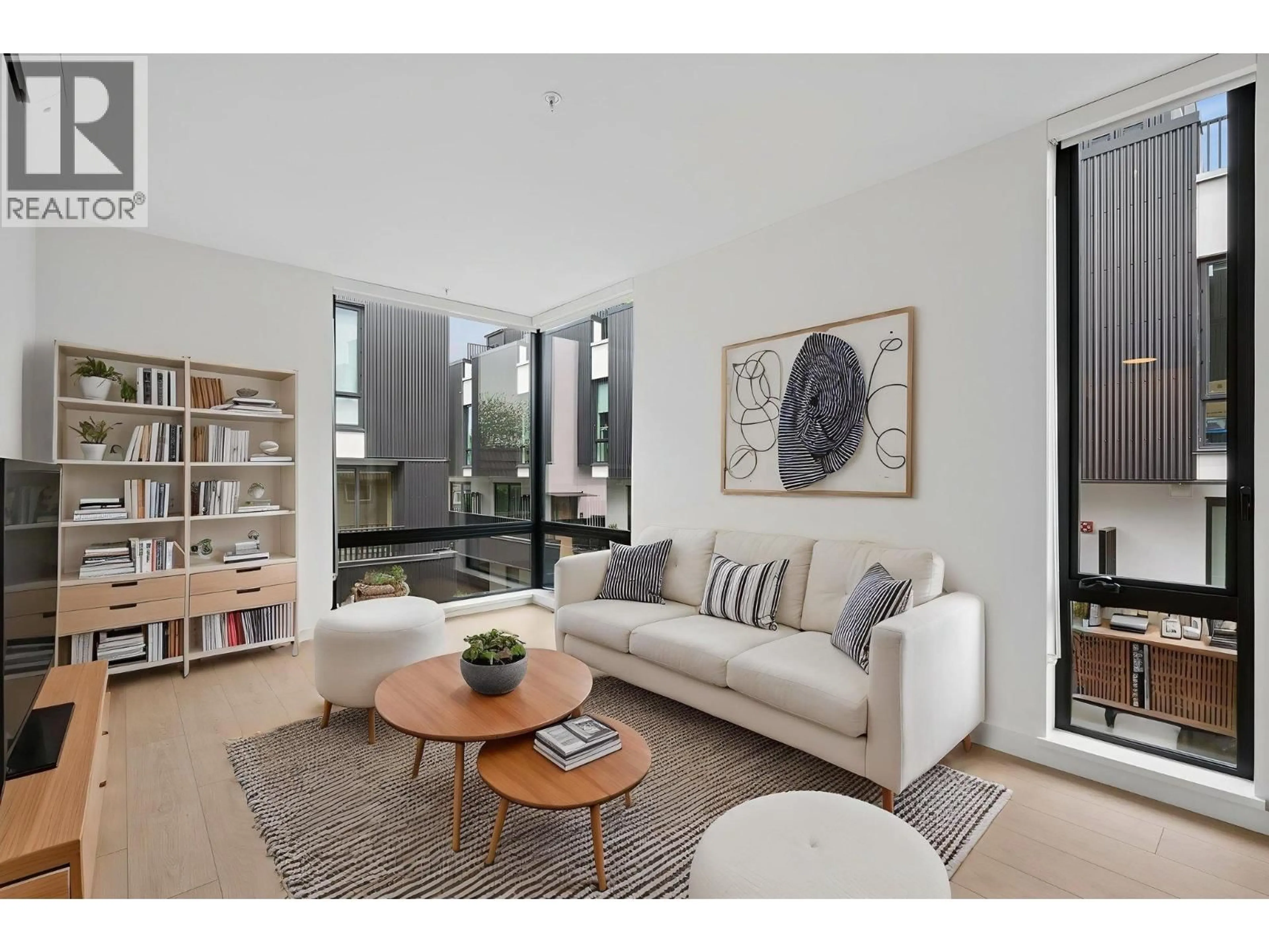 Living room with furniture, unknown for 221 - 2820 NANAIMO STREET, Vancouver British Columbia V5N0E3