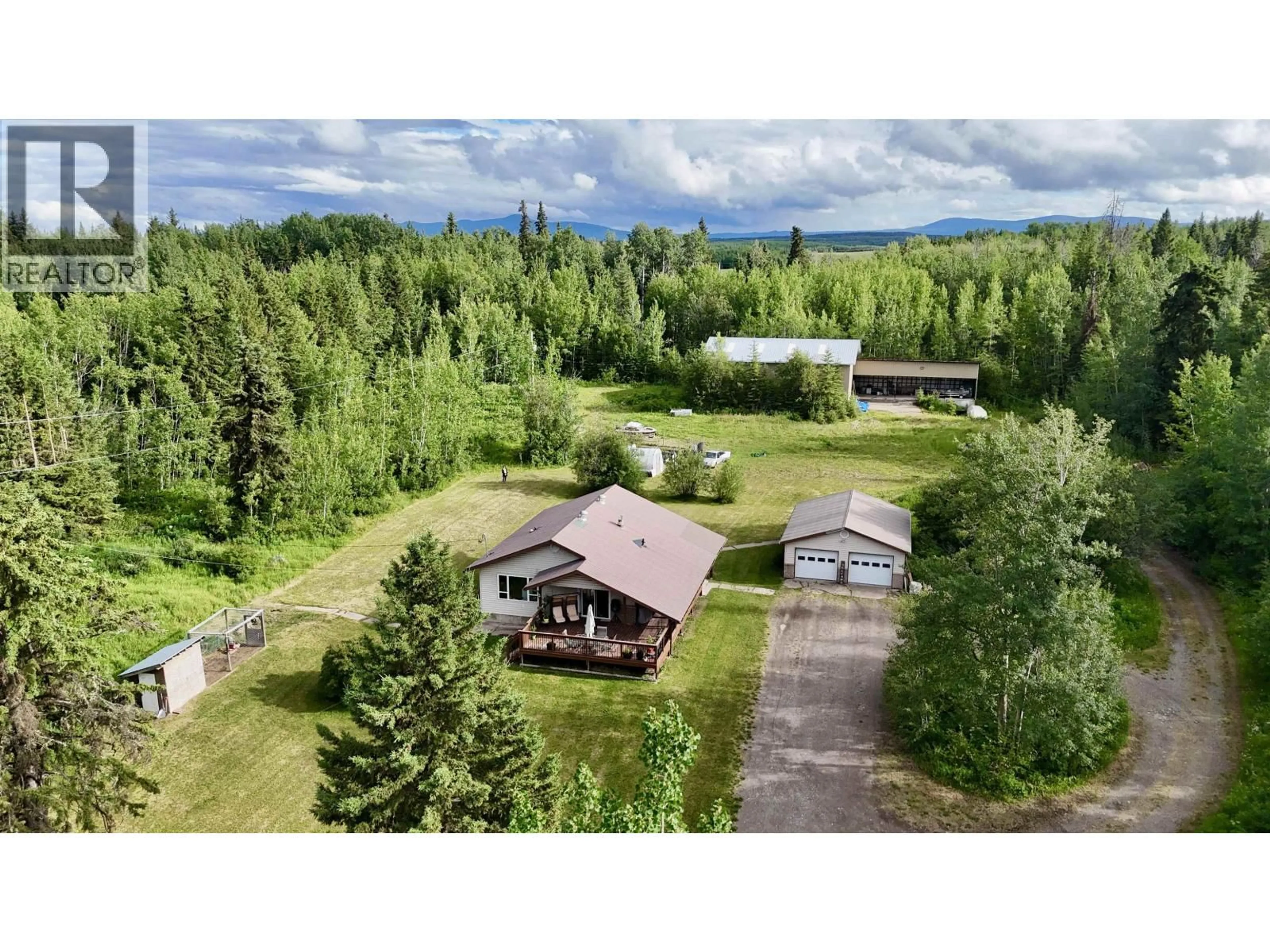 A pic from outside/outdoor area/front of a property/back of a property/a pic from drone, mountain view for 826 OAK STREET, Vanderhoof British Columbia V0J3A1