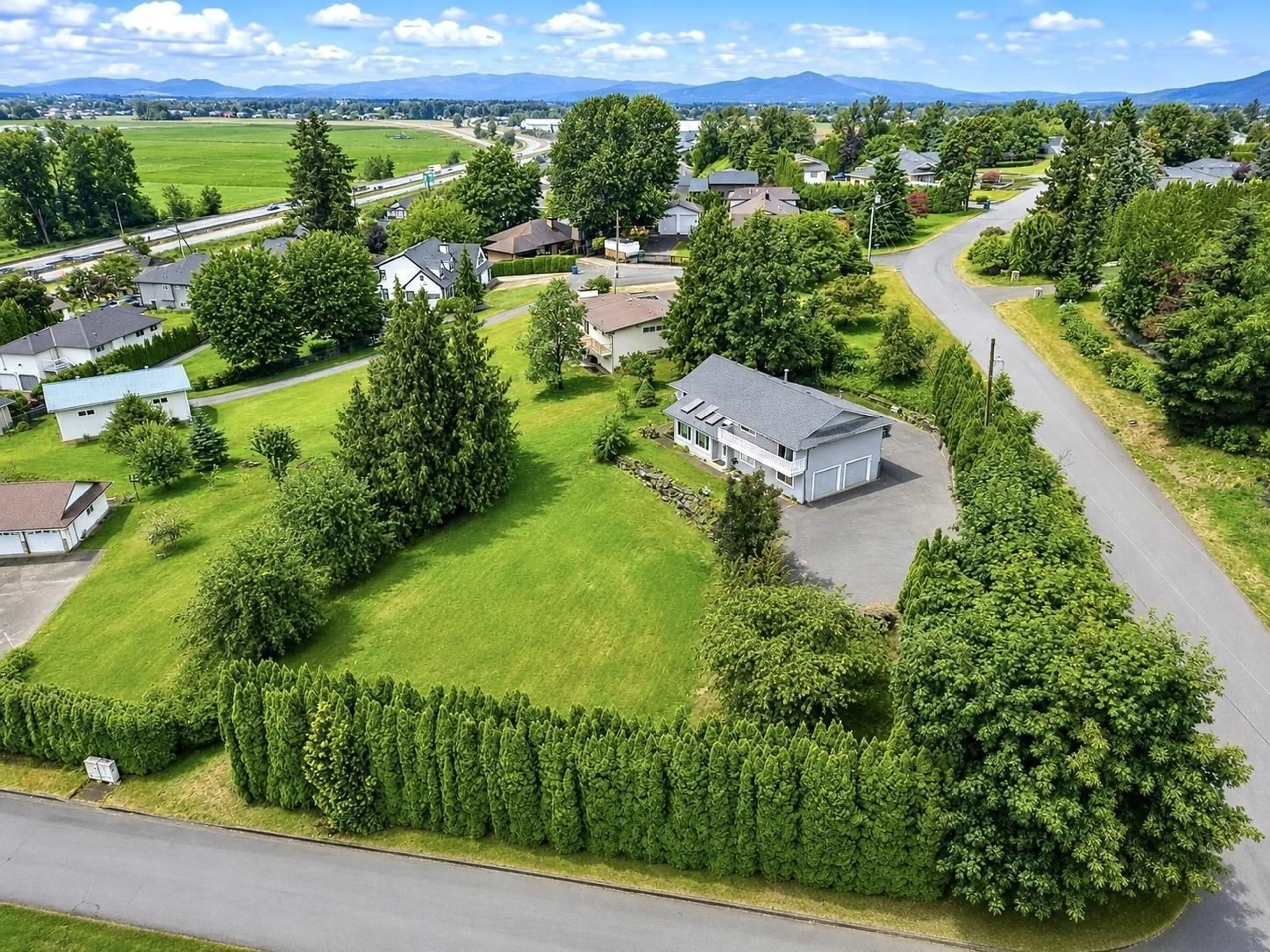 A pic from outside/outdoor area/front of a property/back of a property/a pic from drone, mountain view for 1783 EVERETT ROAD, Abbotsford British Columbia V2S7S4