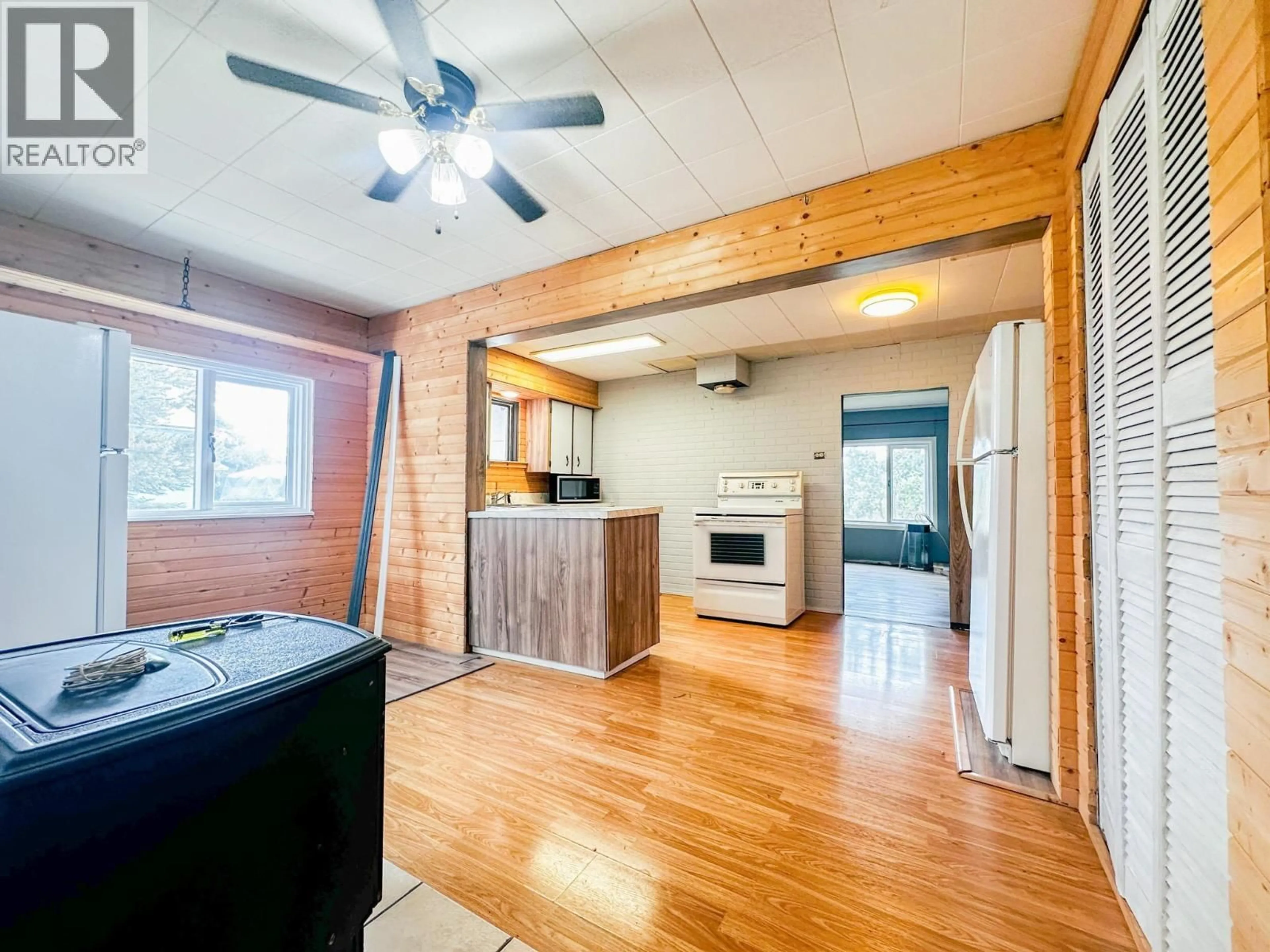 Open concept kitchen, wood/laminate floor for 1880 NASH ROAD, Burns Lake British Columbia V0J1E1