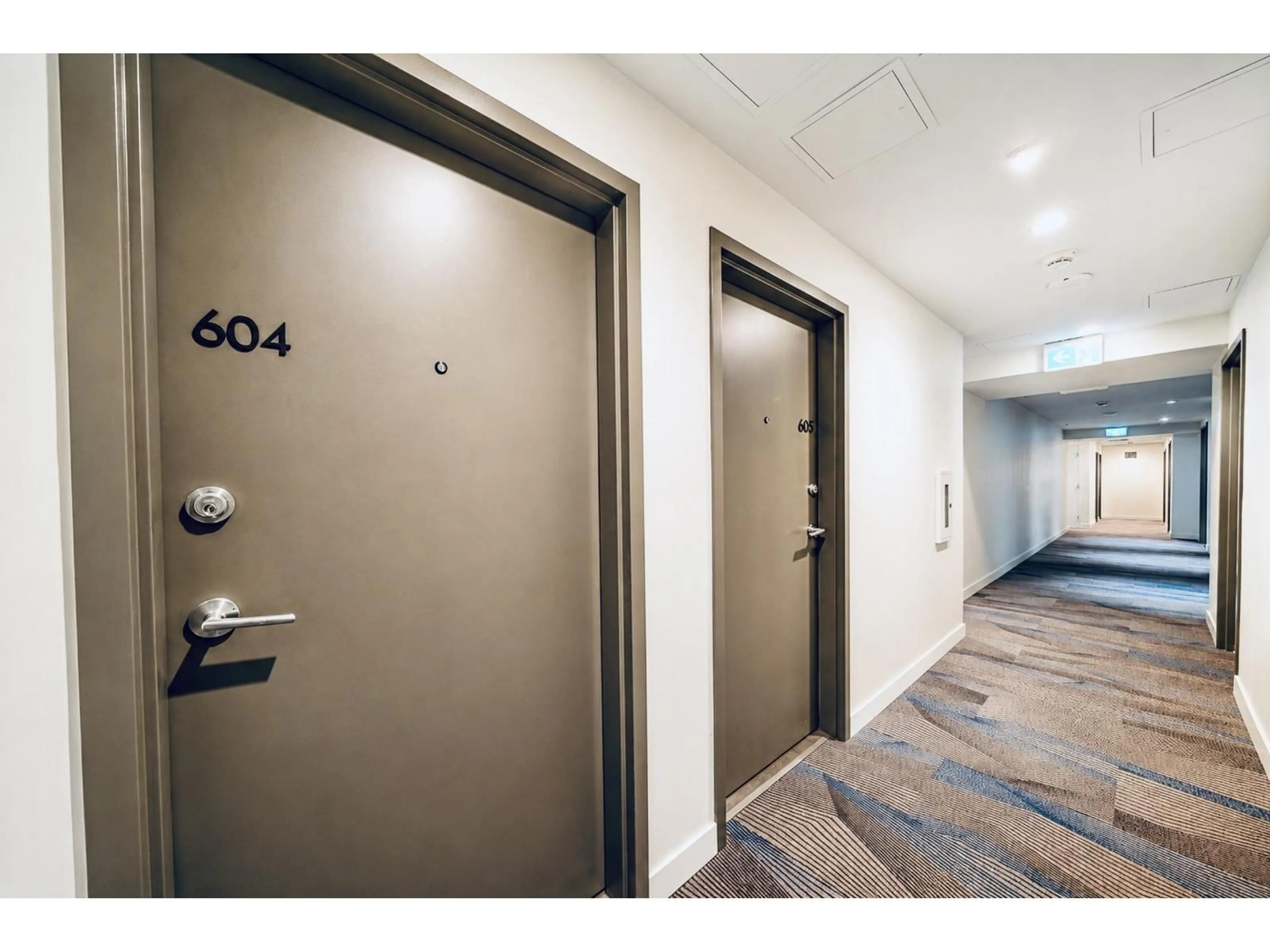 Indoor foyer for 604 - 13615 FRASER HIGHWAY, Surrey British Columbia V3T0P7