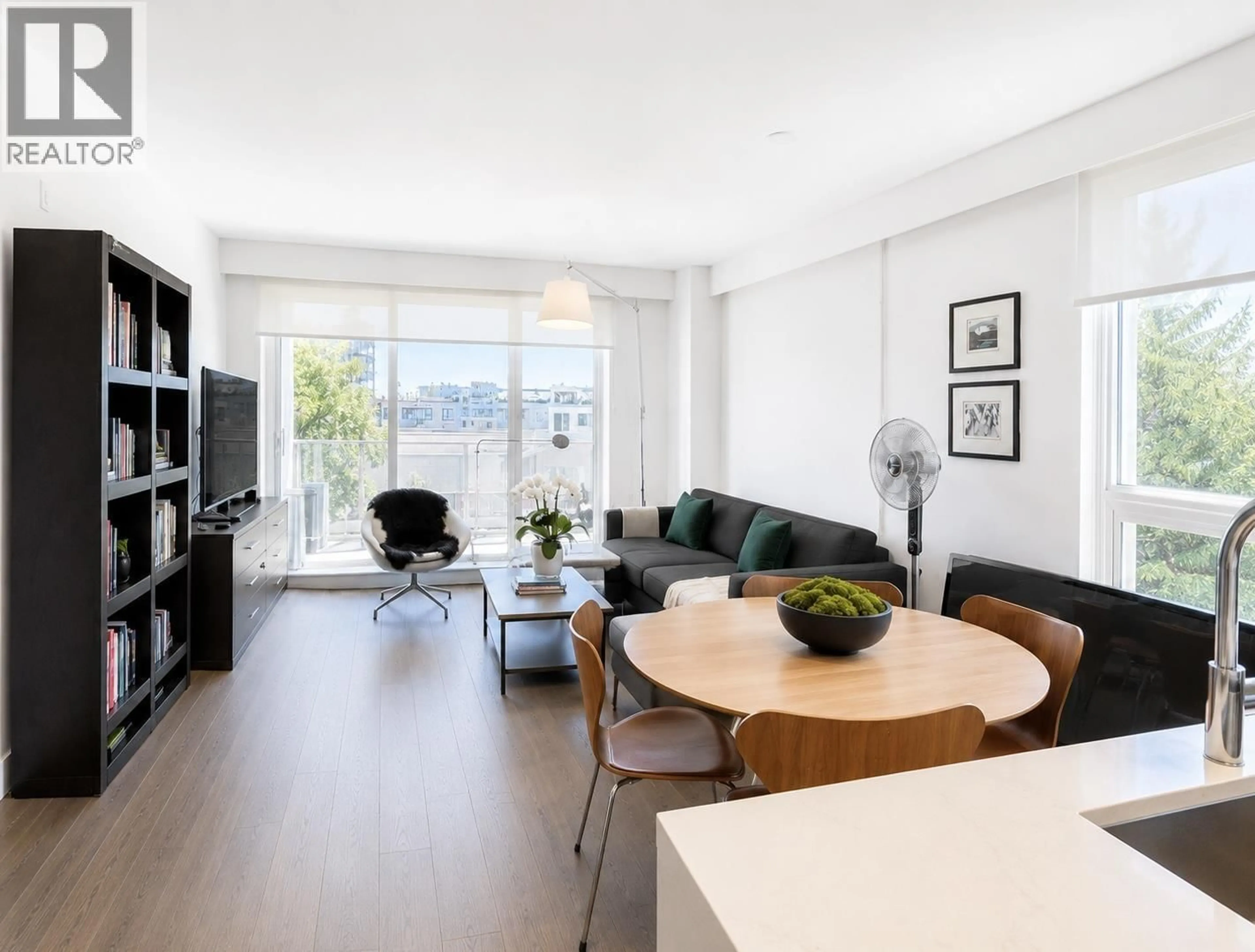 Living room with furniture, wood/laminate floor for 304 - 5693 ELIZABETH STREET, Vancouver British Columbia V5Y3K1