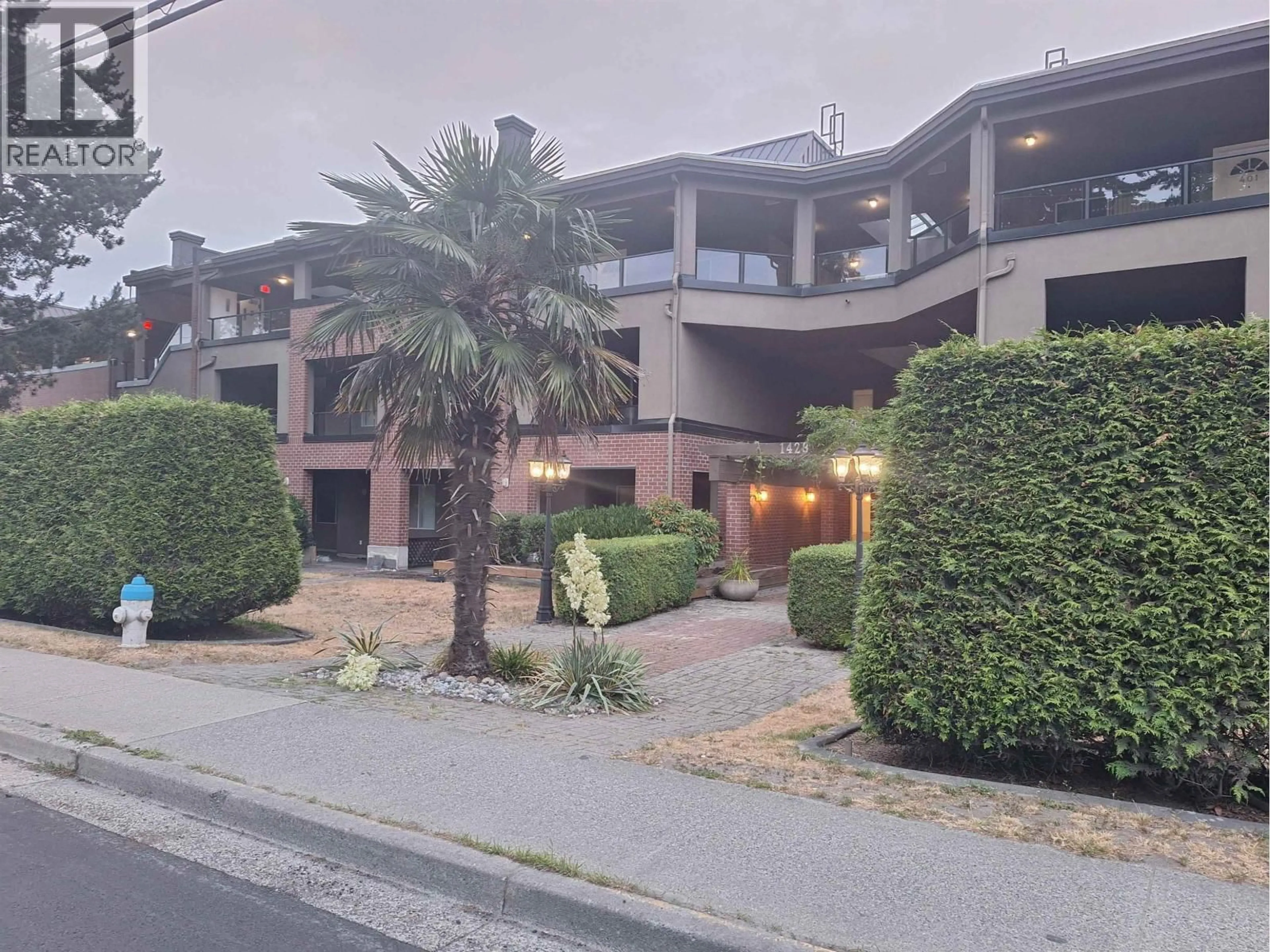 A pic from outside/outdoor area/front of a property/back of a property/a pic from drone, street for 207 - 1428 56 STREET, Delta British Columbia V4L2A7