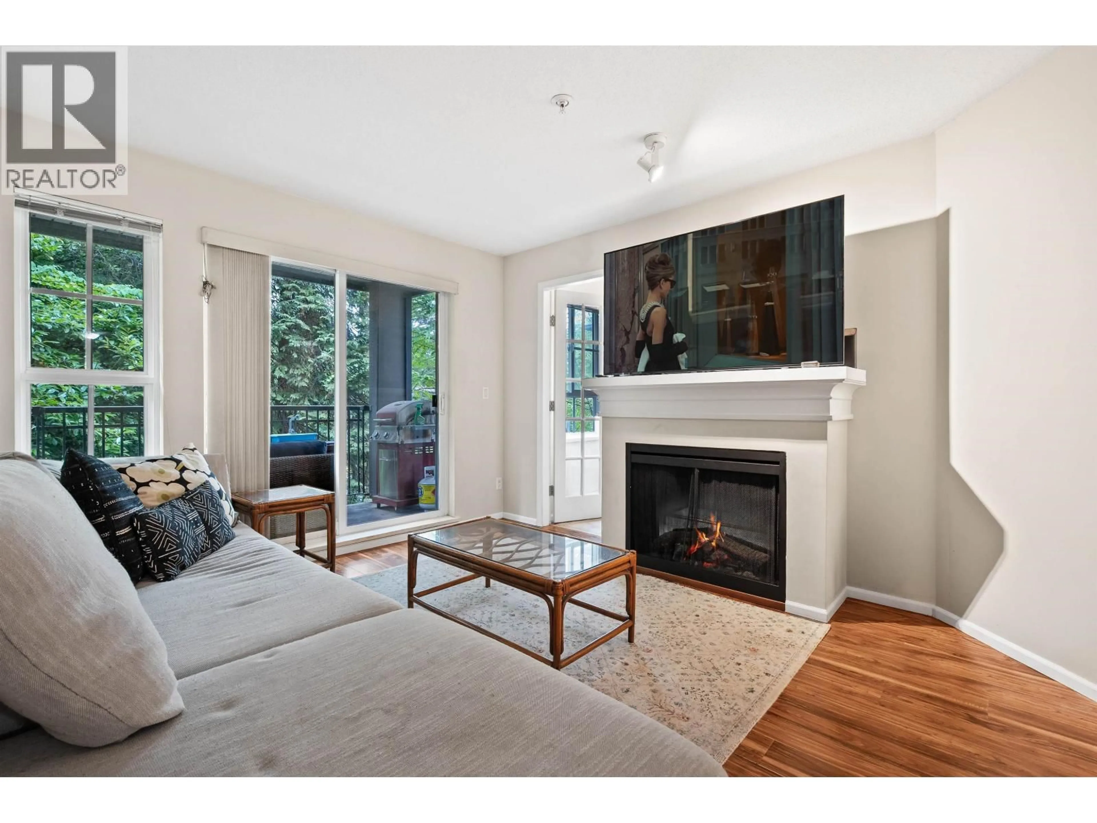 Living room with furniture, wood/laminate floor for 311 - 3388 MORREY COURT, Burnaby British Columbia V3J7Y5