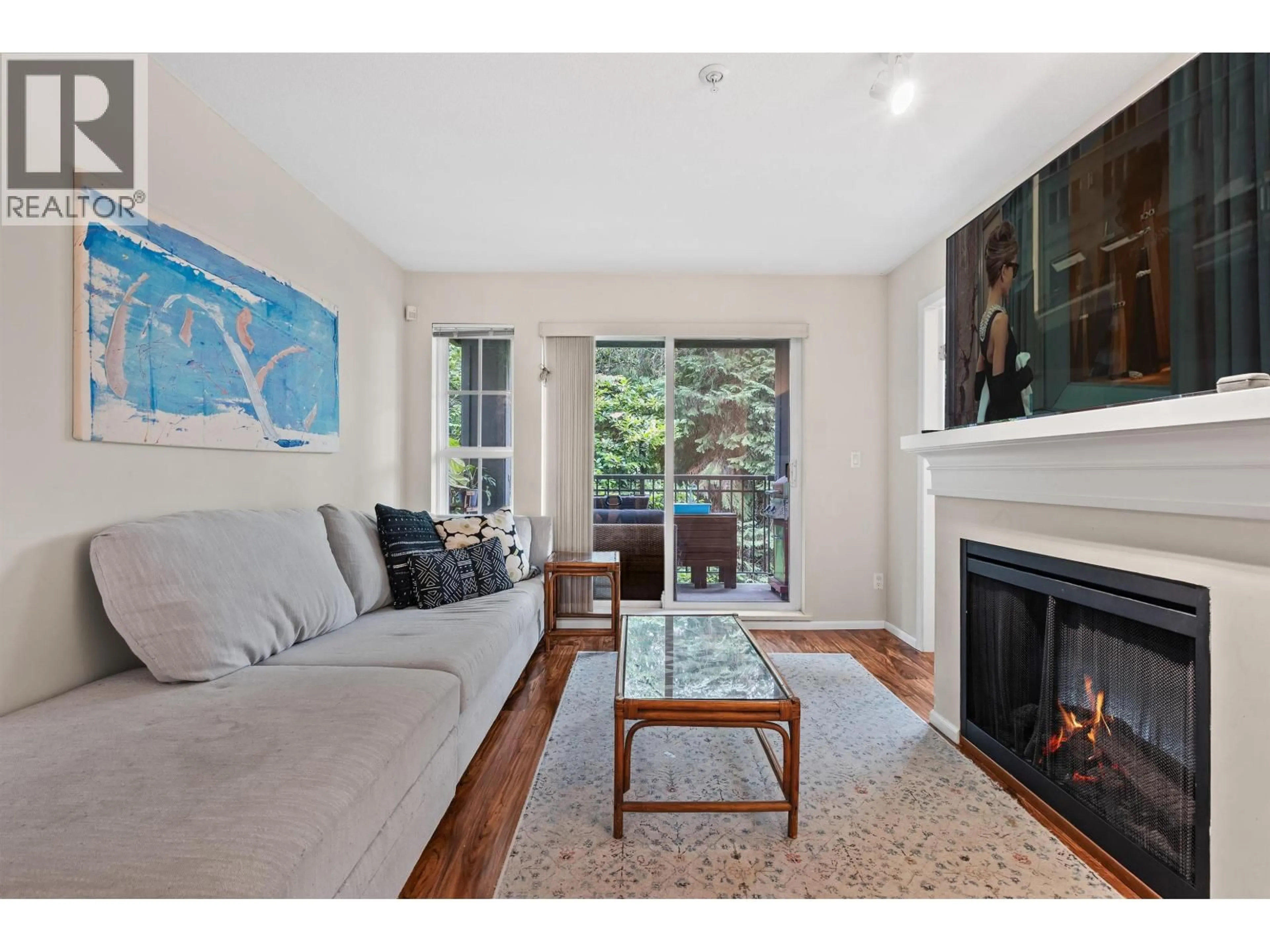 Living room with furniture, wood/laminate floor for 311 - 3388 MORREY COURT, Burnaby British Columbia V3J7Y5