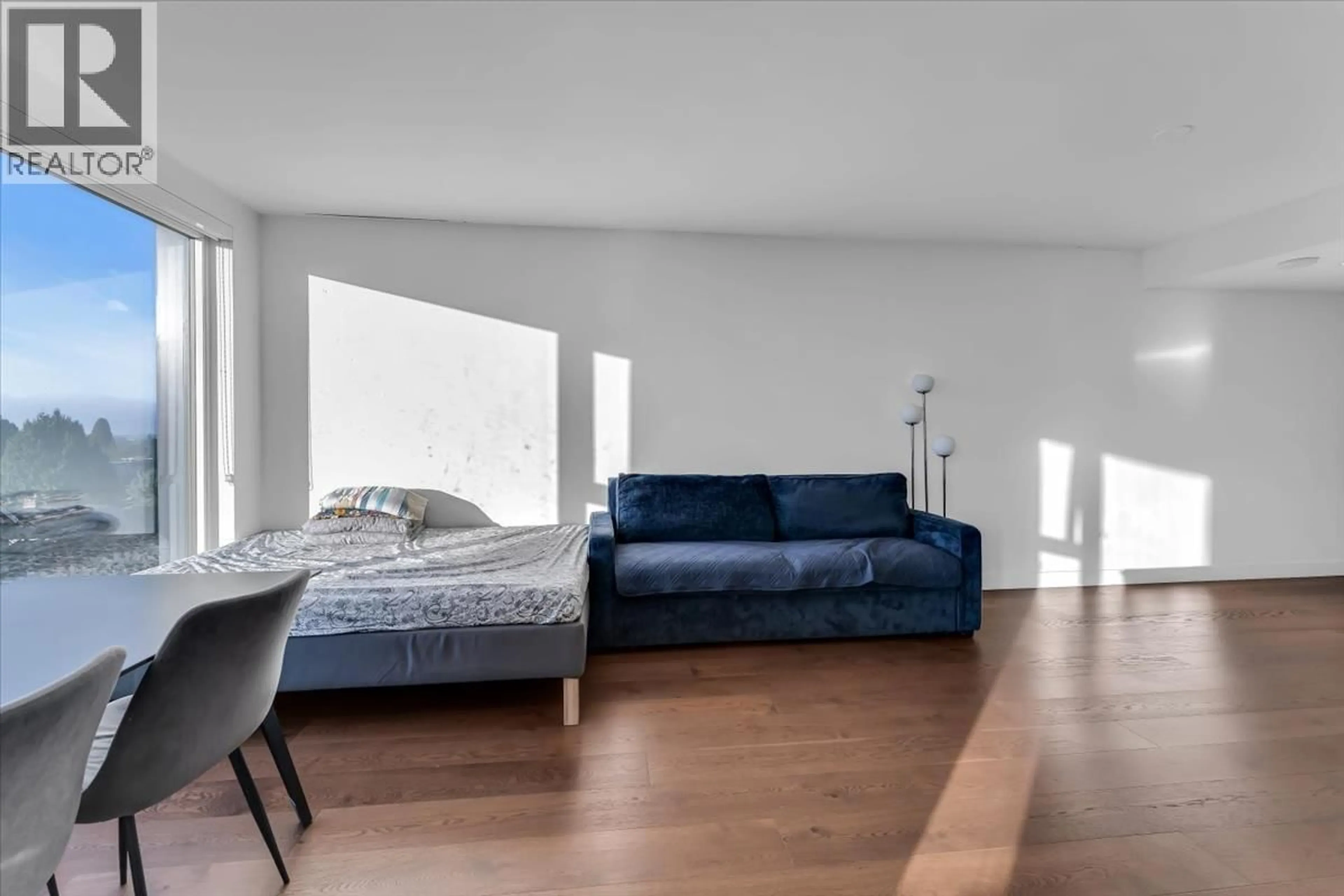 Living room with furniture, wood/laminate floor for 607 - 1571 57TH AVENUE, Vancouver British Columbia V6P0H7
