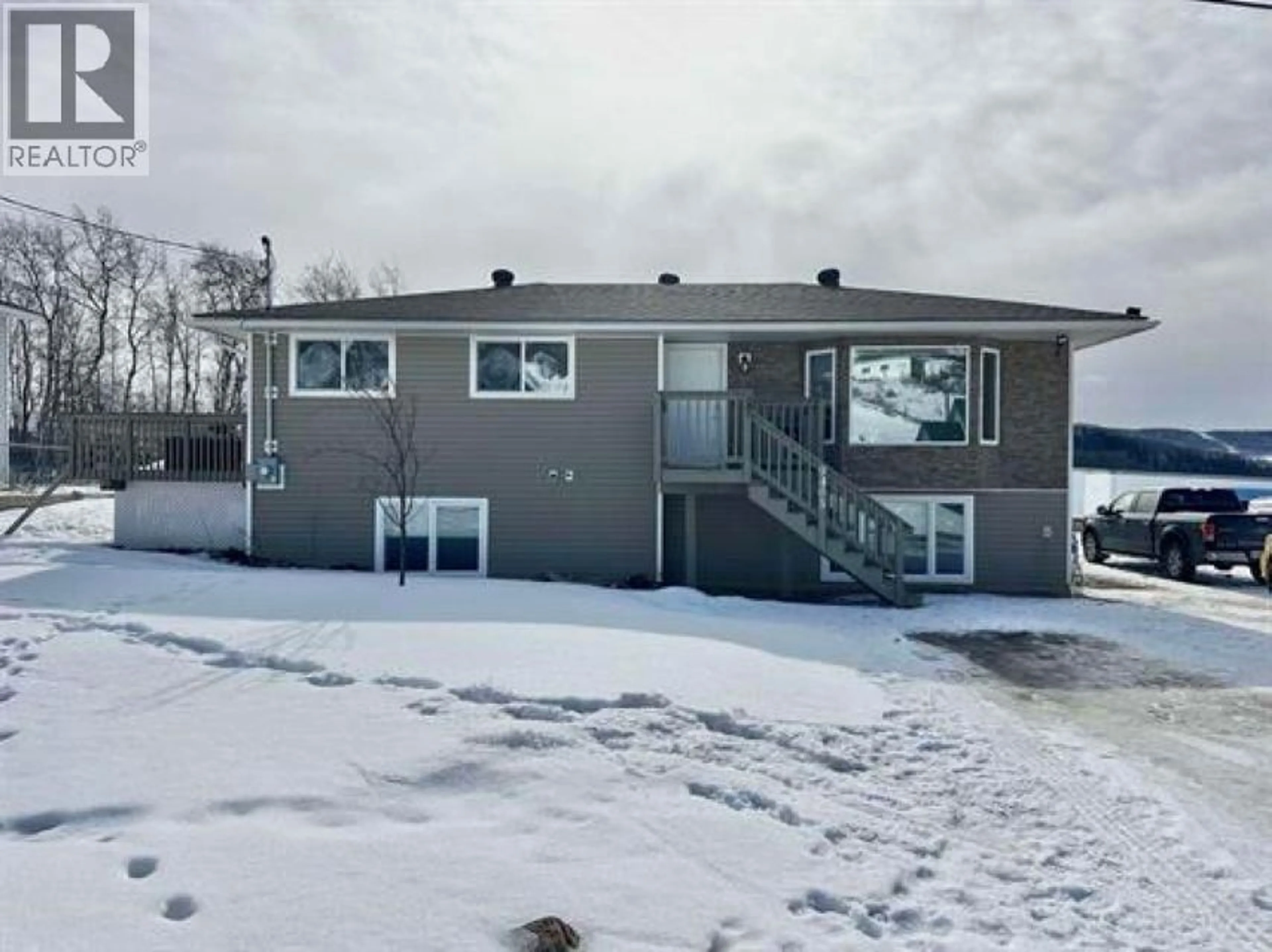A pic from outside/outdoor area/front of a property/back of a property/a pic from drone, unknown for 9405 RIVER DRIVE, Fort St. John British Columbia V1J4M7