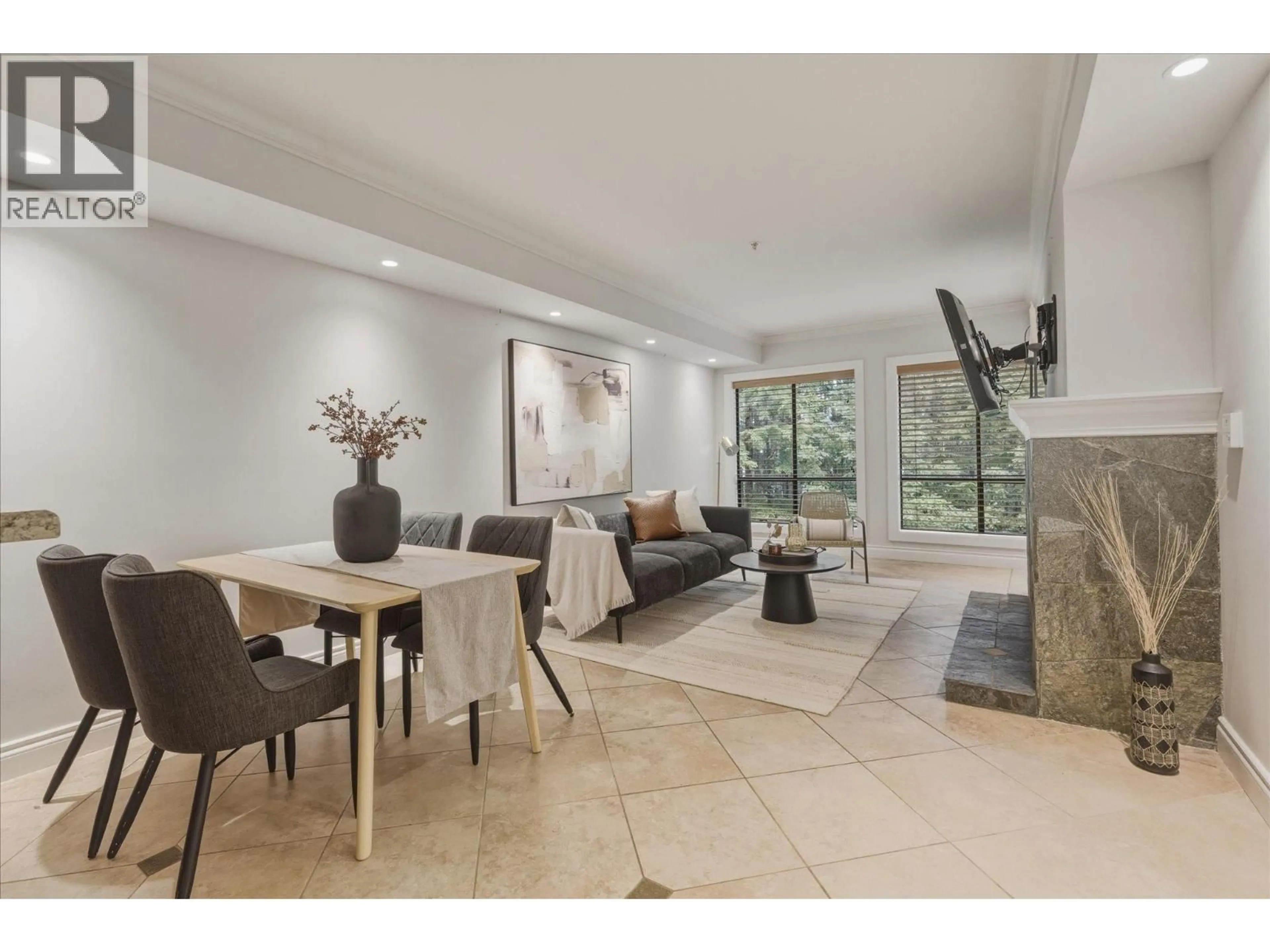Living room with furniture, ceramic/tile floor for 101 - 4821 SPEARHEAD DRIVE, Whistler British Columbia V8E1E8