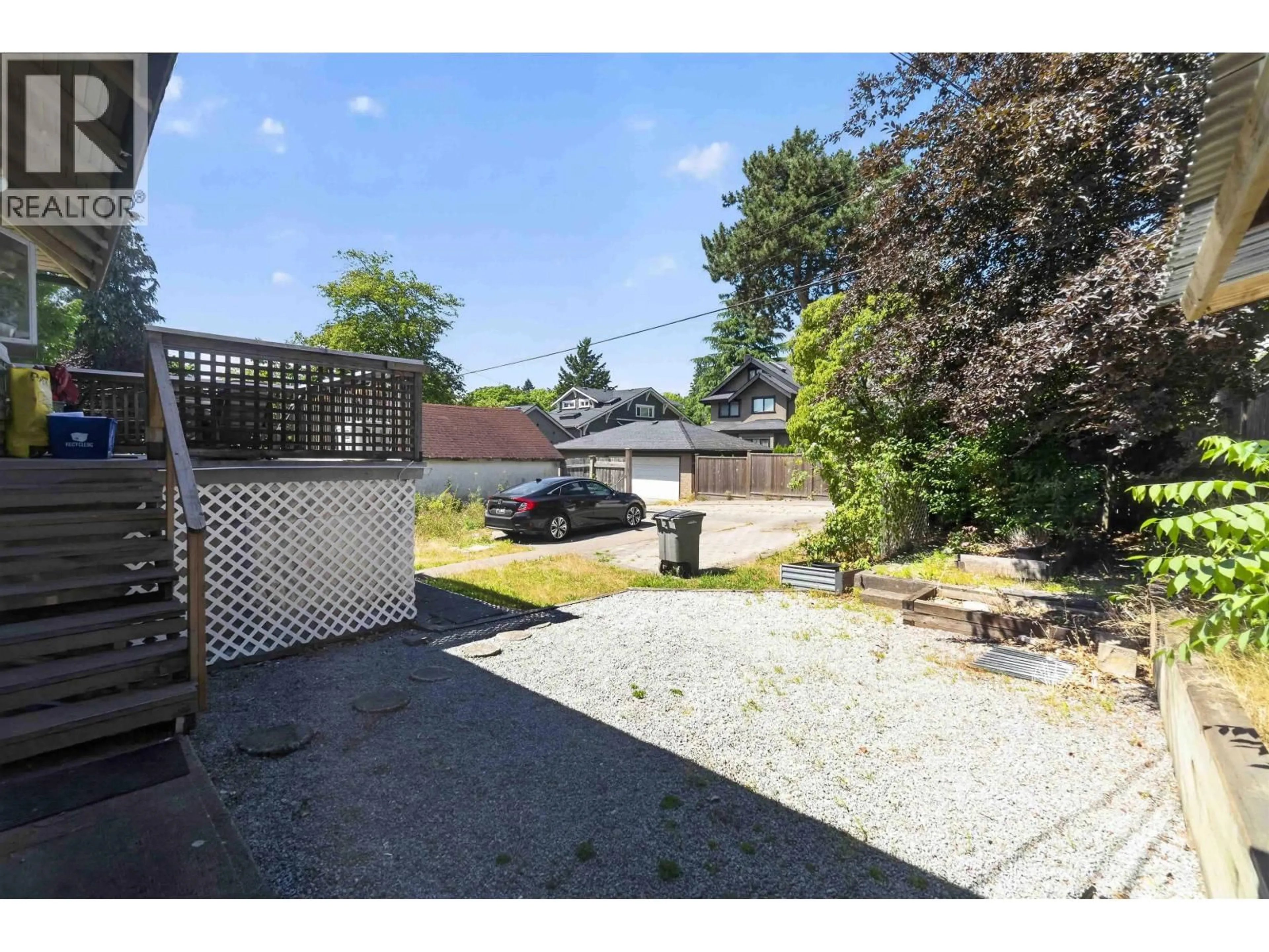 A pic from outside/outdoor area/front of a property/back of a property/a pic from drone, street for 2063 37TH AVENUE, Vancouver British Columbia V6M1N7