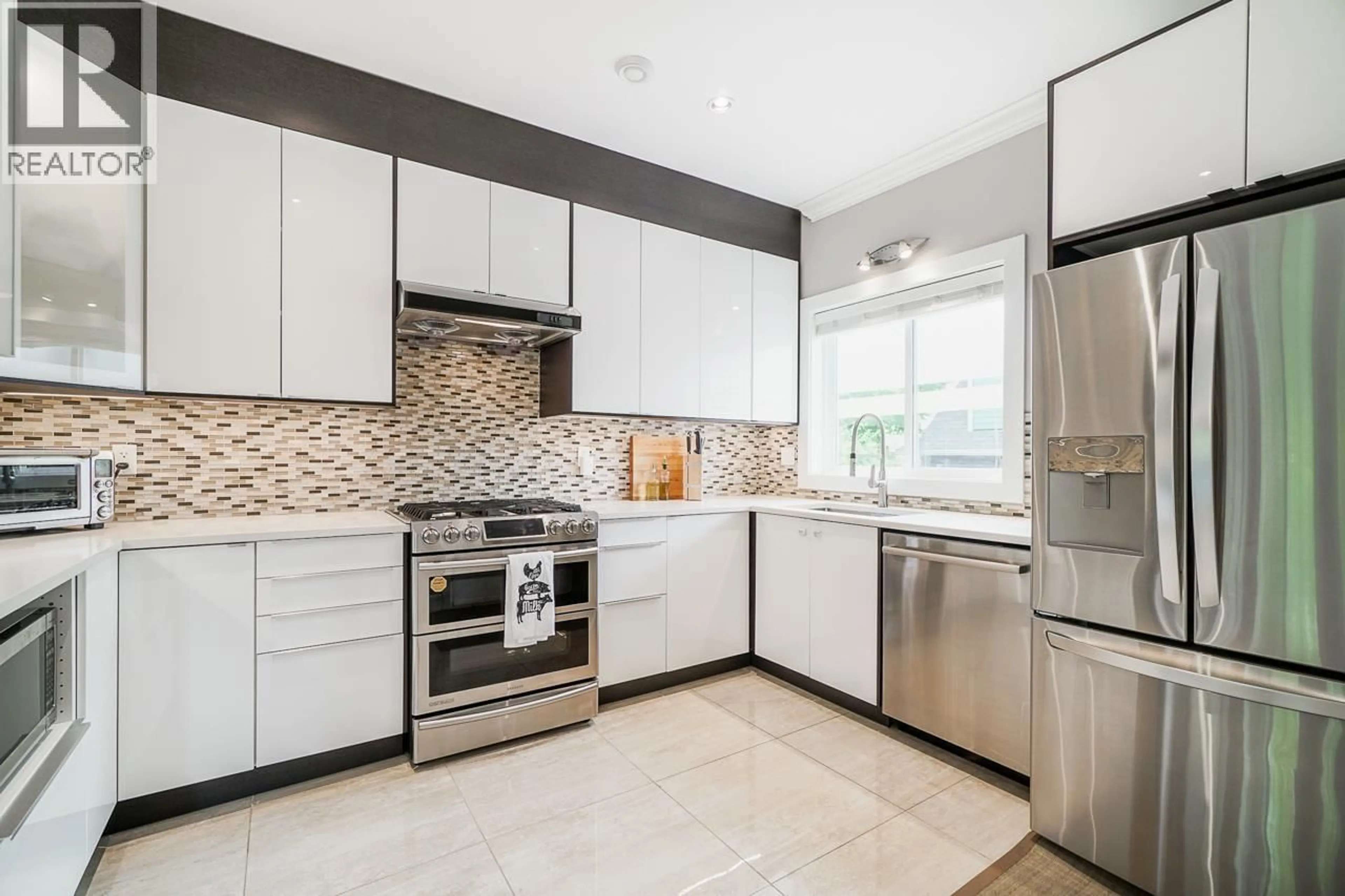 Contemporary kitchen, ceramic/tile floor for 5603 RHODES STREET, Vancouver British Columbia V5R3P2