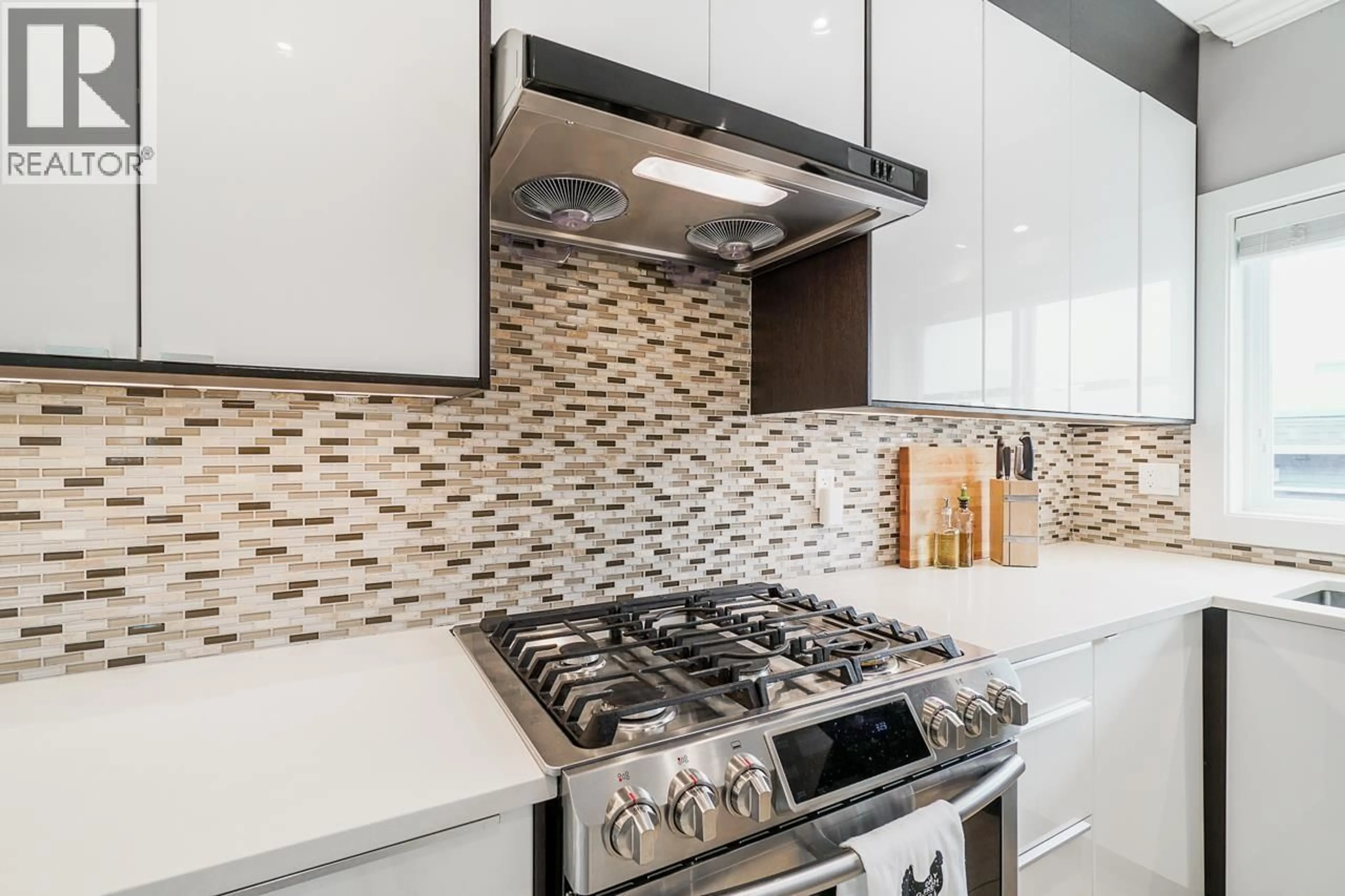 Contemporary kitchen, ceramic/tile floor for 5603 RHODES STREET, Vancouver British Columbia V5R3P2