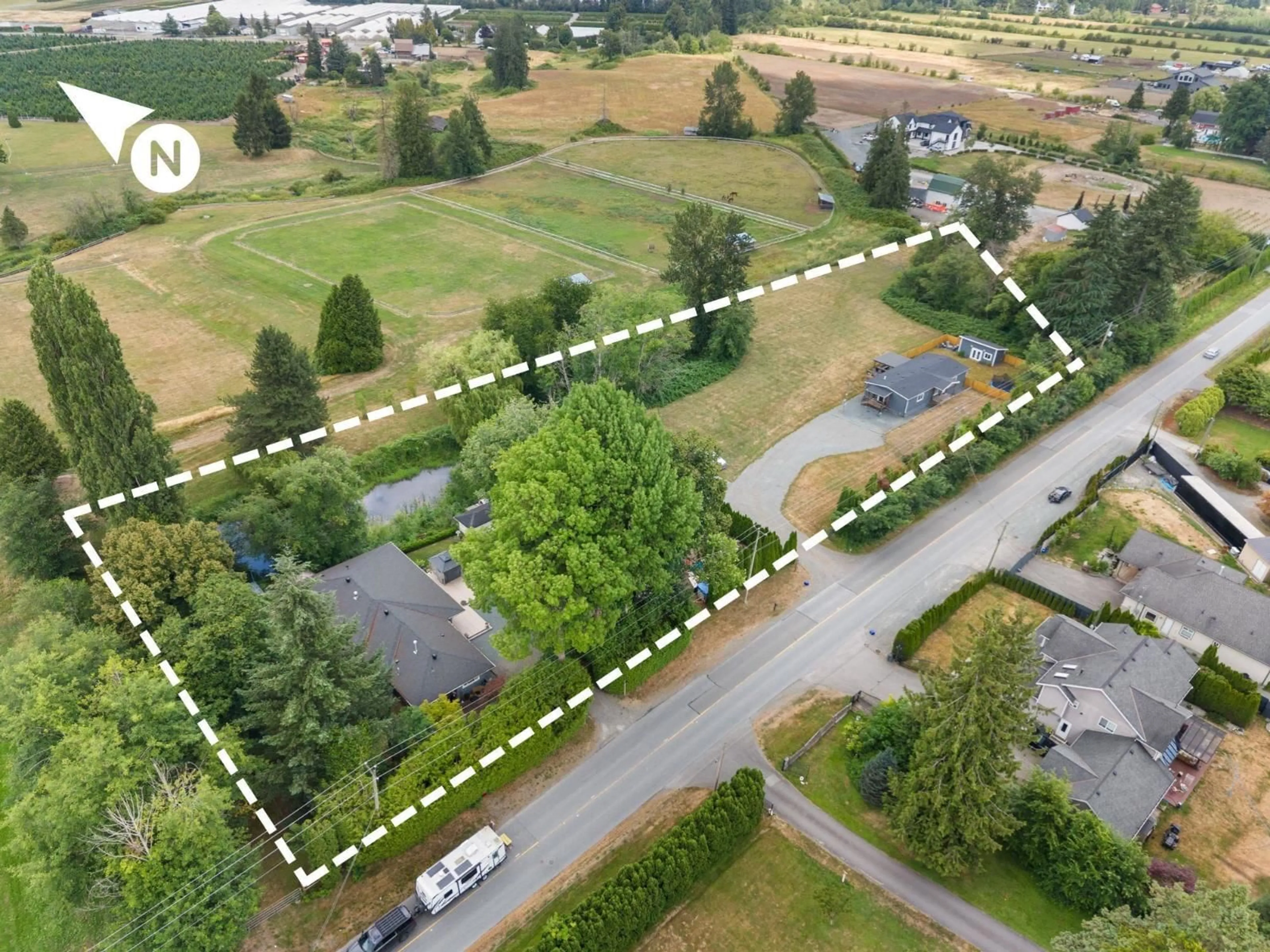 A pic from outside/outdoor area/front of a property/back of a property/a pic from drone, street for 21857 64 AVENUE, Langley British Columbia V2Y2N7