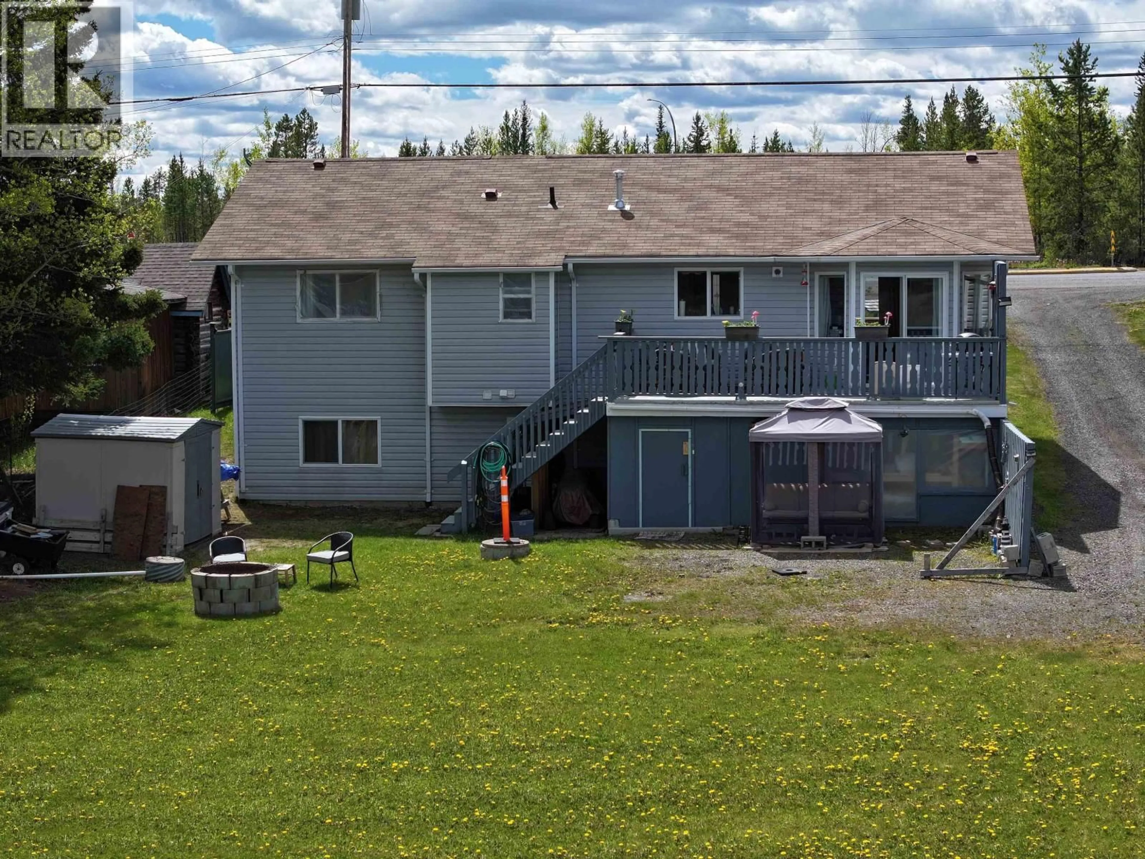 A pic from outside/outdoor area/front of a property/back of a property/a pic from drone, unknown for 7036 93 MILE FRONTAGE ROAD, 100 Mile House British Columbia V0K2E2