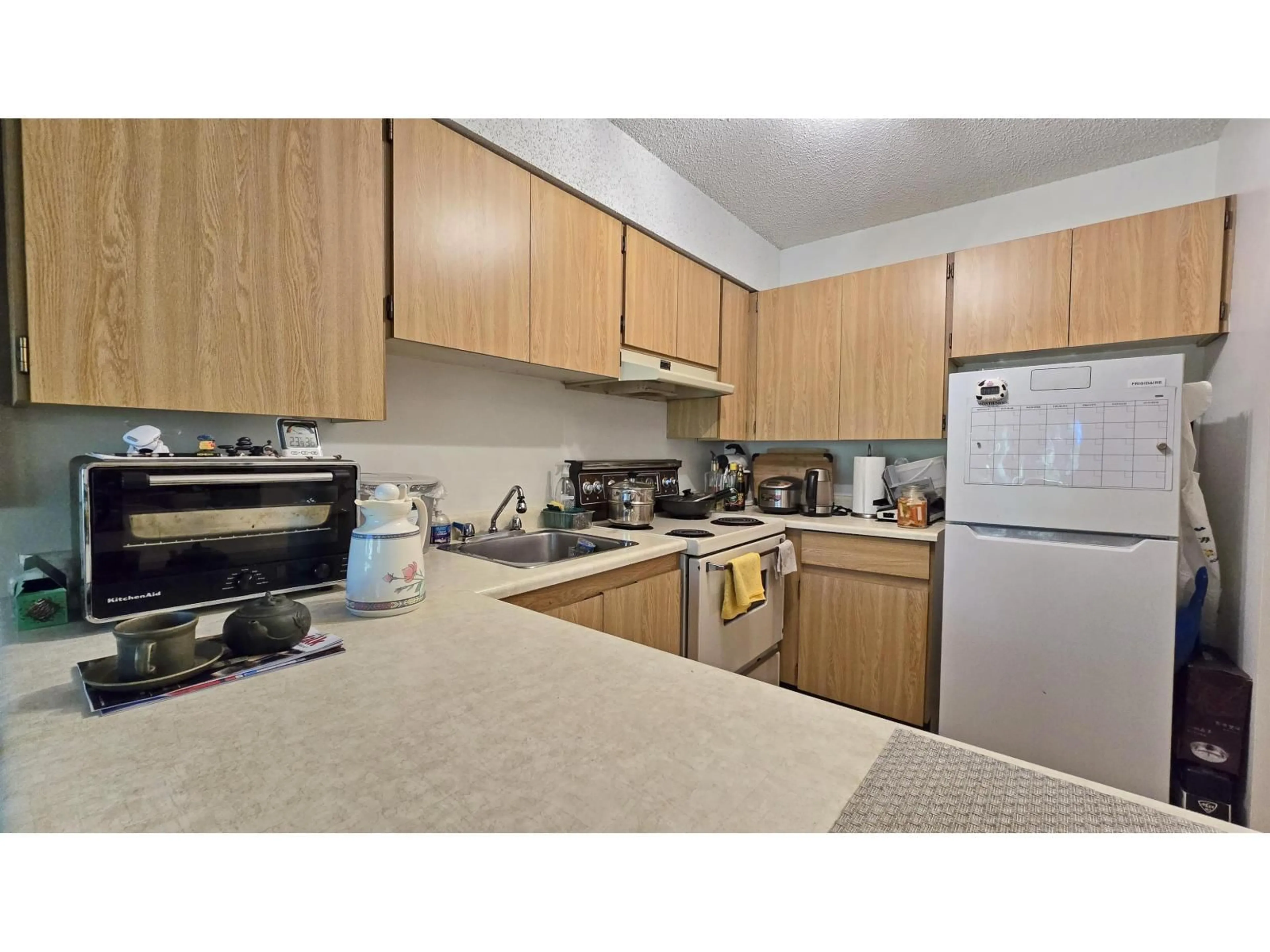 Standard kitchen, unknown for 210 - 7144 133B STREET, Surrey British Columbia V3W8A4