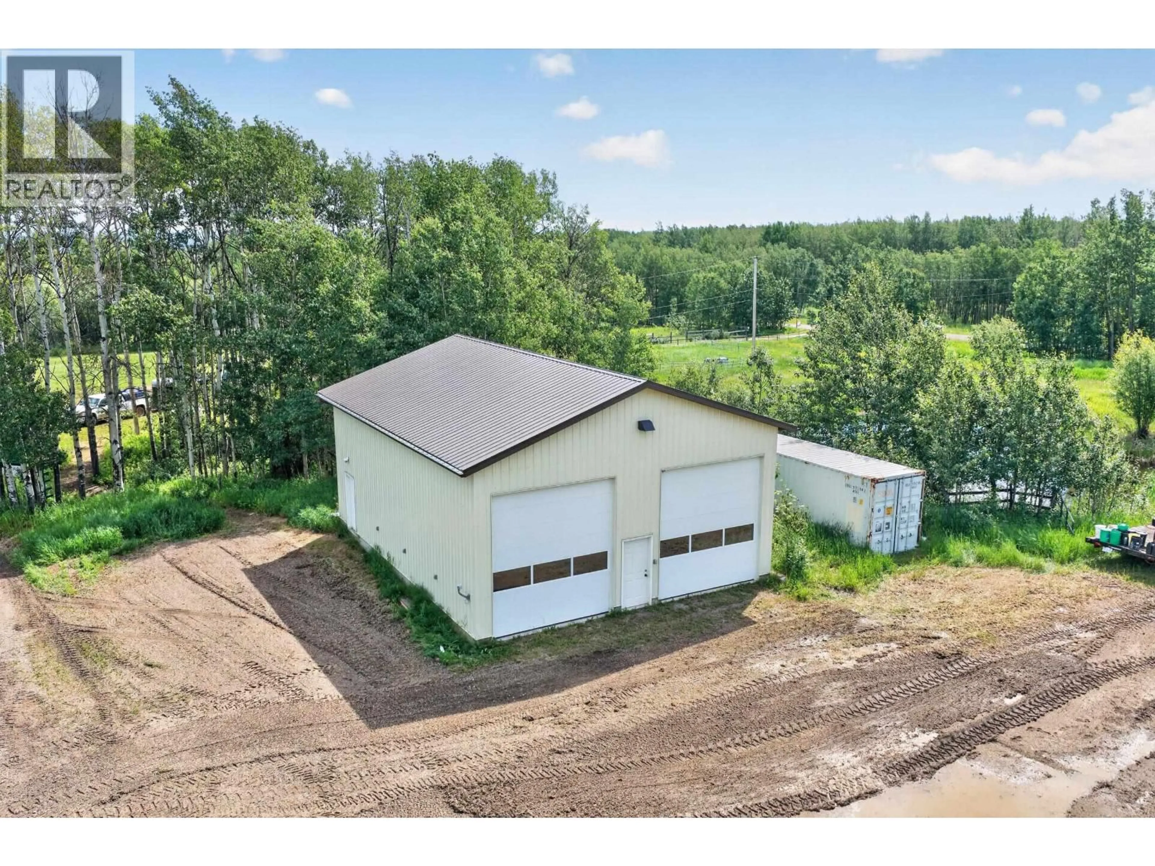 A pic from outside/outdoor area/front of a property/back of a property/a pic from drone, building for 10826 260 ROAD, Fort St. John British Columbia V0C1Y0