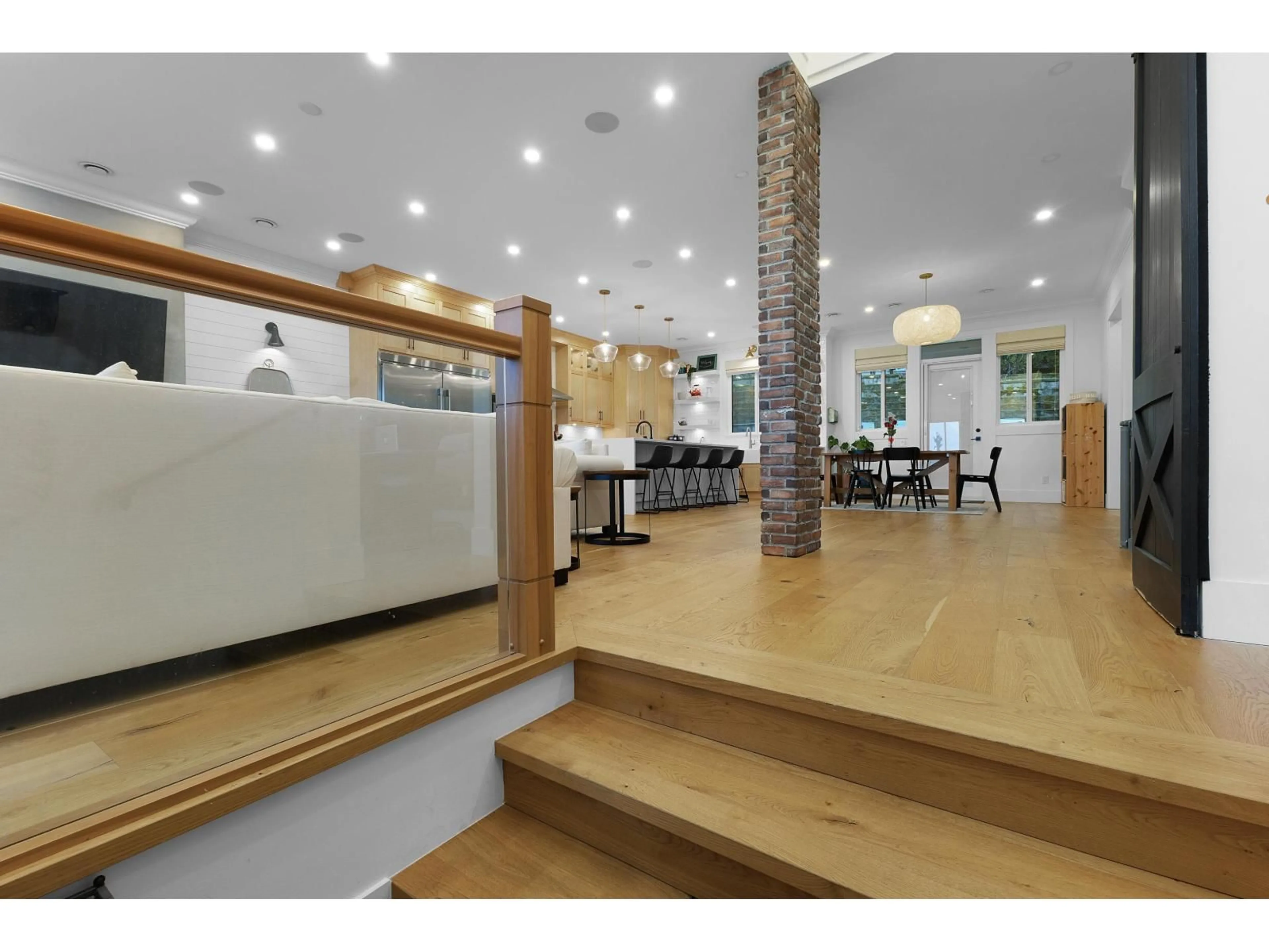 Open concept kitchen, wood/laminate floor for 14910 62A AVENUE, Surrey British Columbia V3S3C4