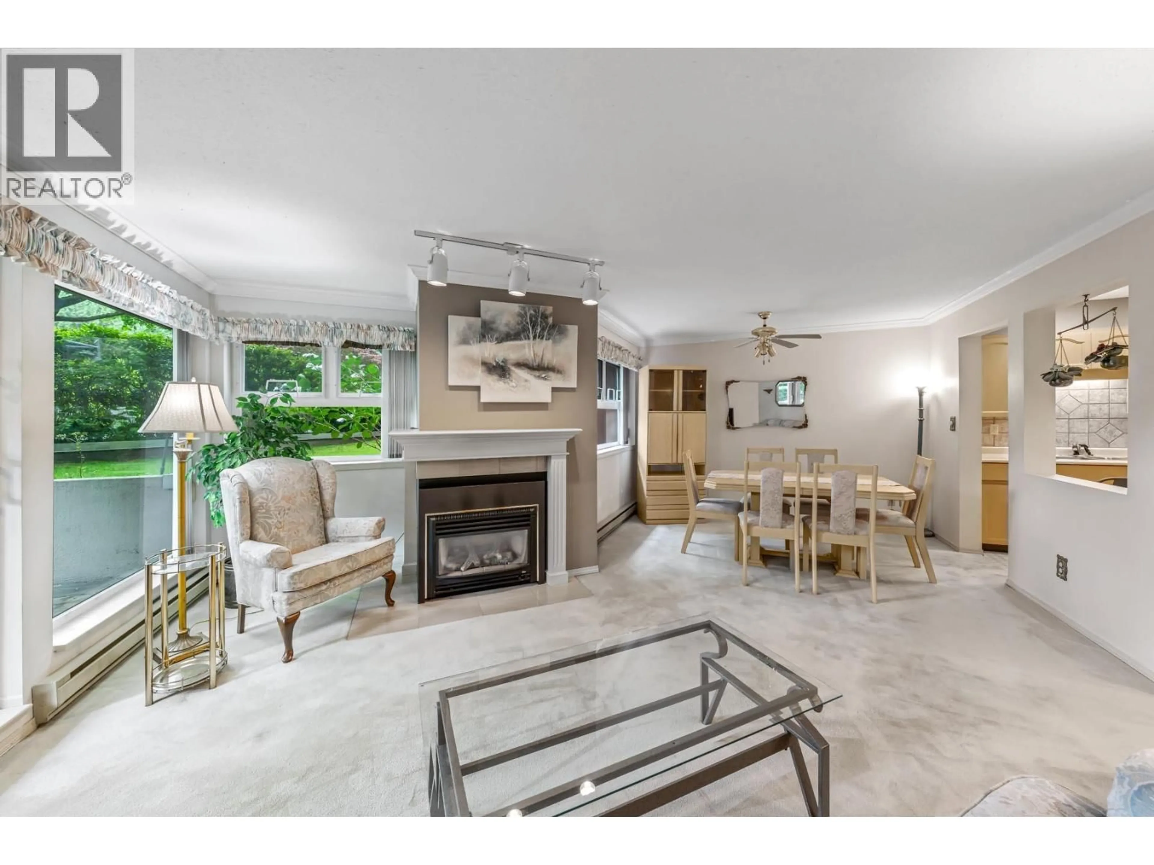Living room with furniture, ceramic/tile floor for 106 - 1240 QUAYSIDE DRIVE, New Westminster British Columbia V3M6H1