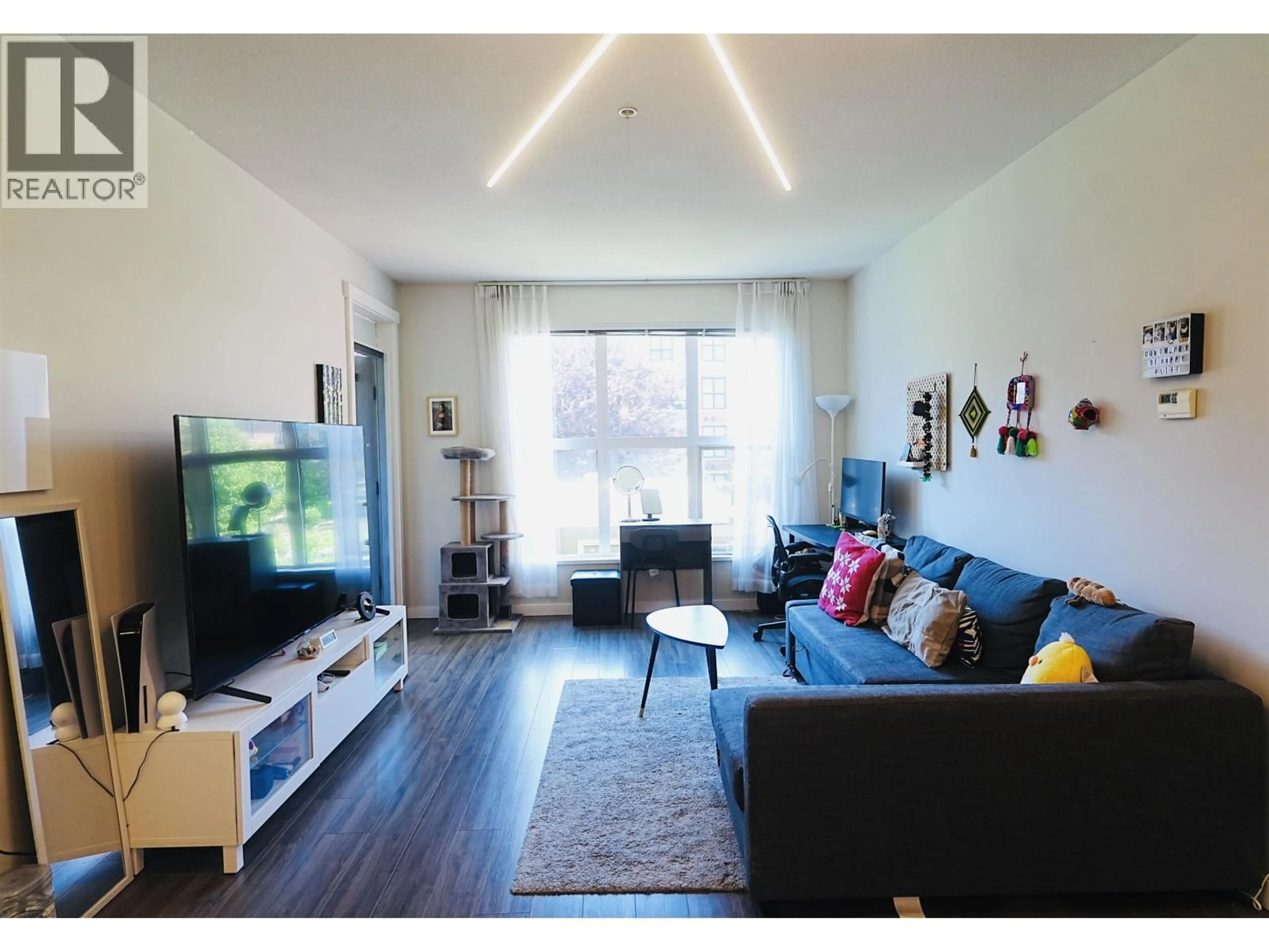 Living room with furniture, wood/laminate floor for 225 - 9551 ALEXANDRA ROAD, Richmond British Columbia V6X0S6