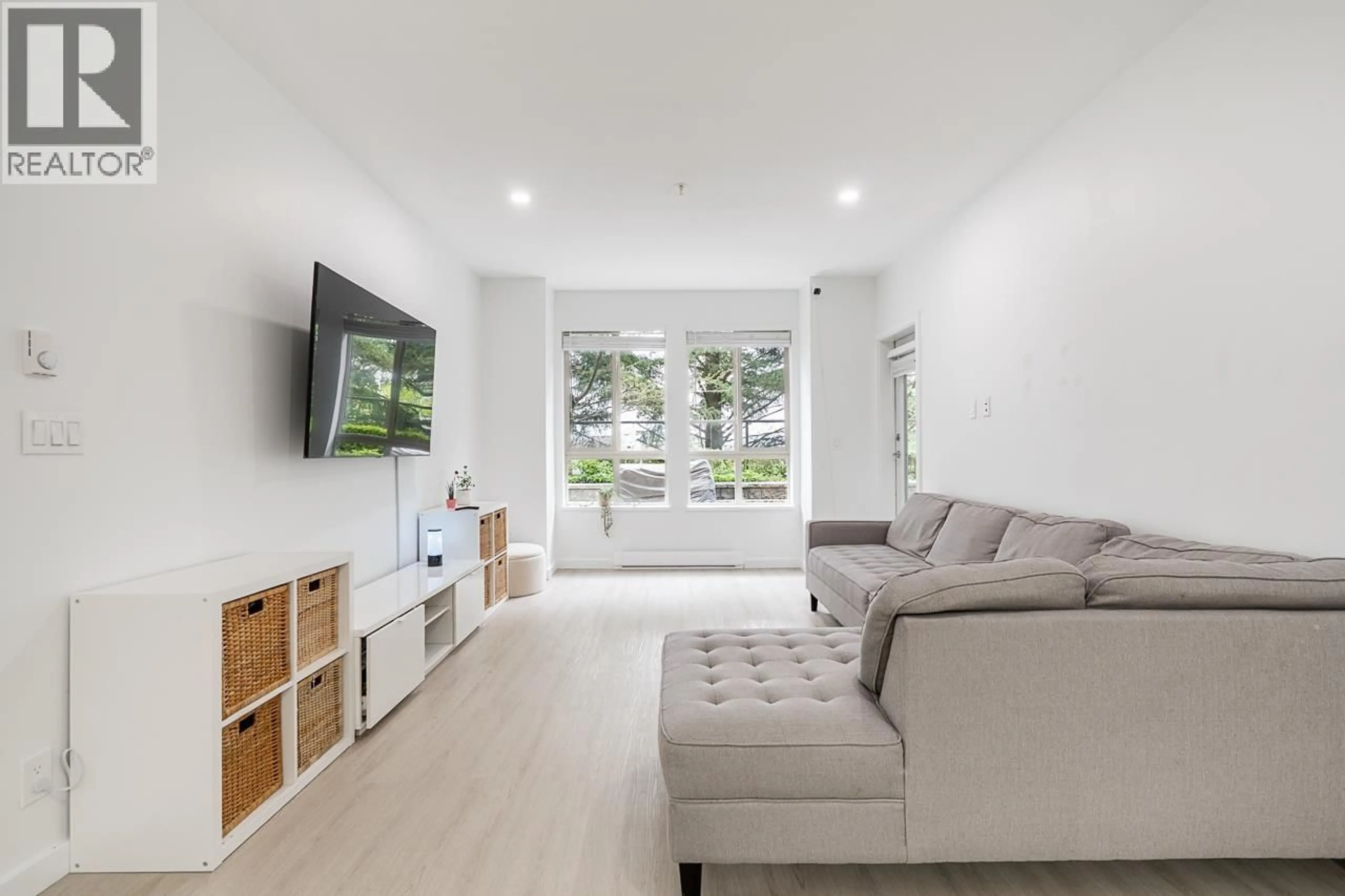 Living room with furniture, unknown for 110 - 225 FRANCIS WAY, New Westminster British Columbia V3L0G1