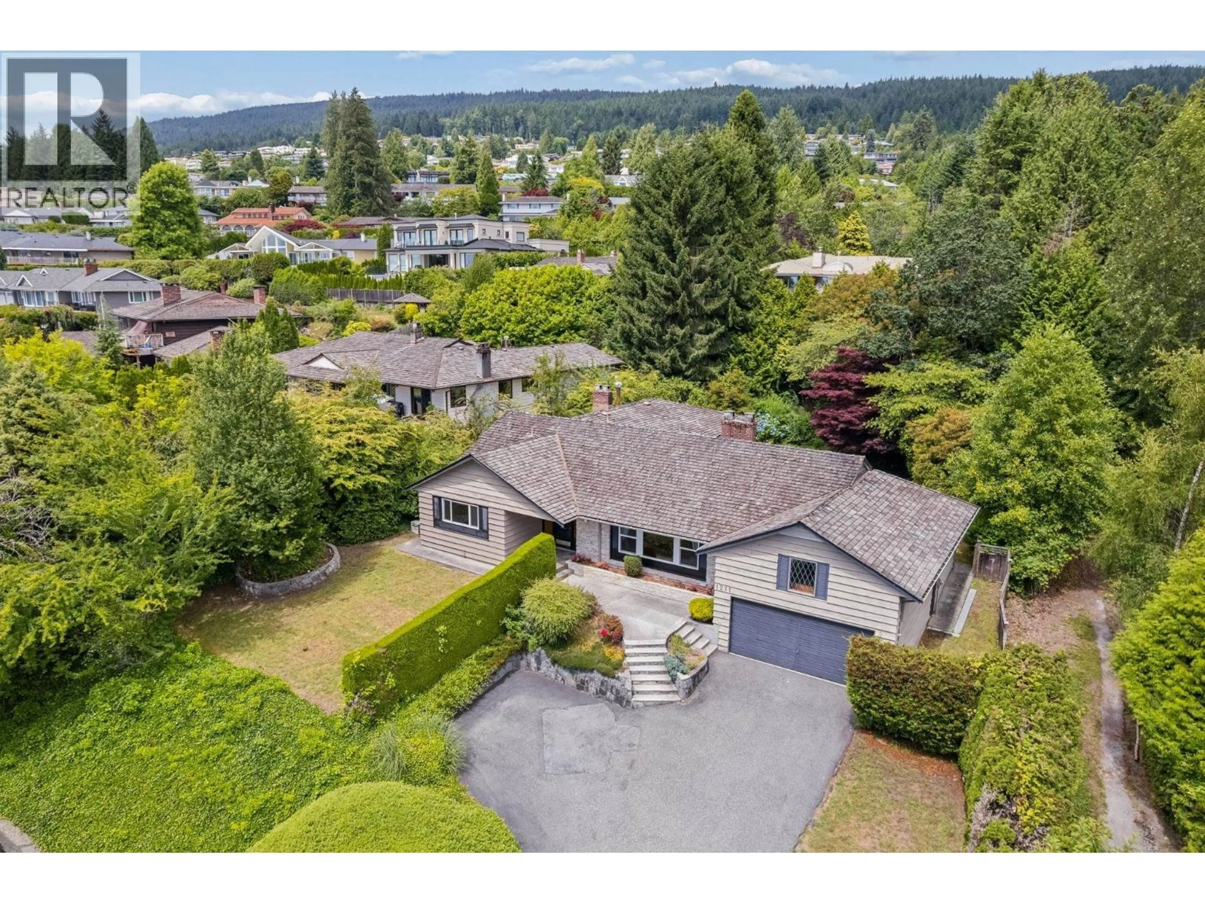 A pic from outside/outdoor area/front of a property/back of a property/a pic from drone, mountain view for 1211 CHARTWELL DRIVE, West Vancouver British Columbia V7S2R1