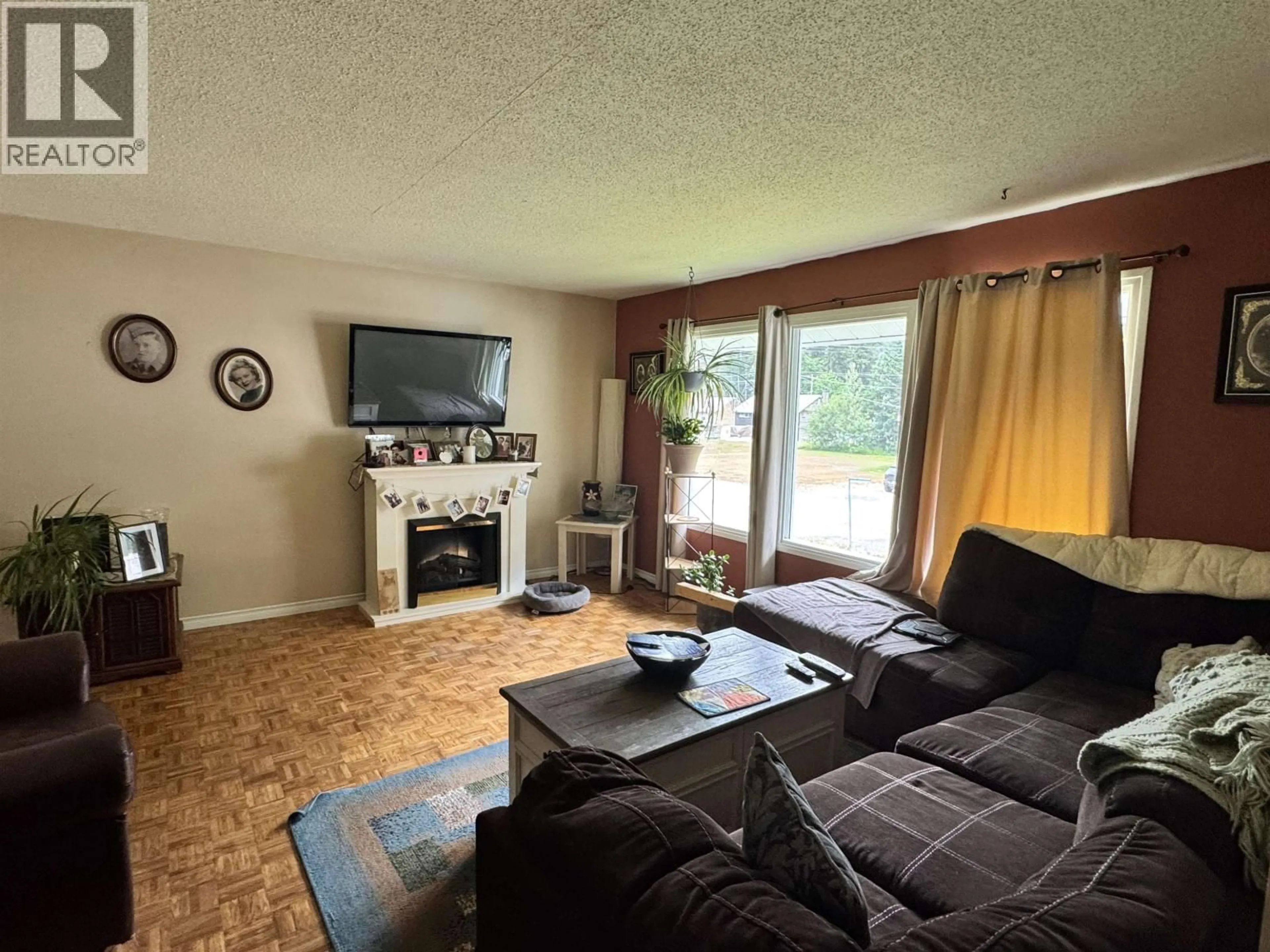 Living room with furniture, unknown for 1304 RAVEN STREET, Stewart British Columbia V0T1W0